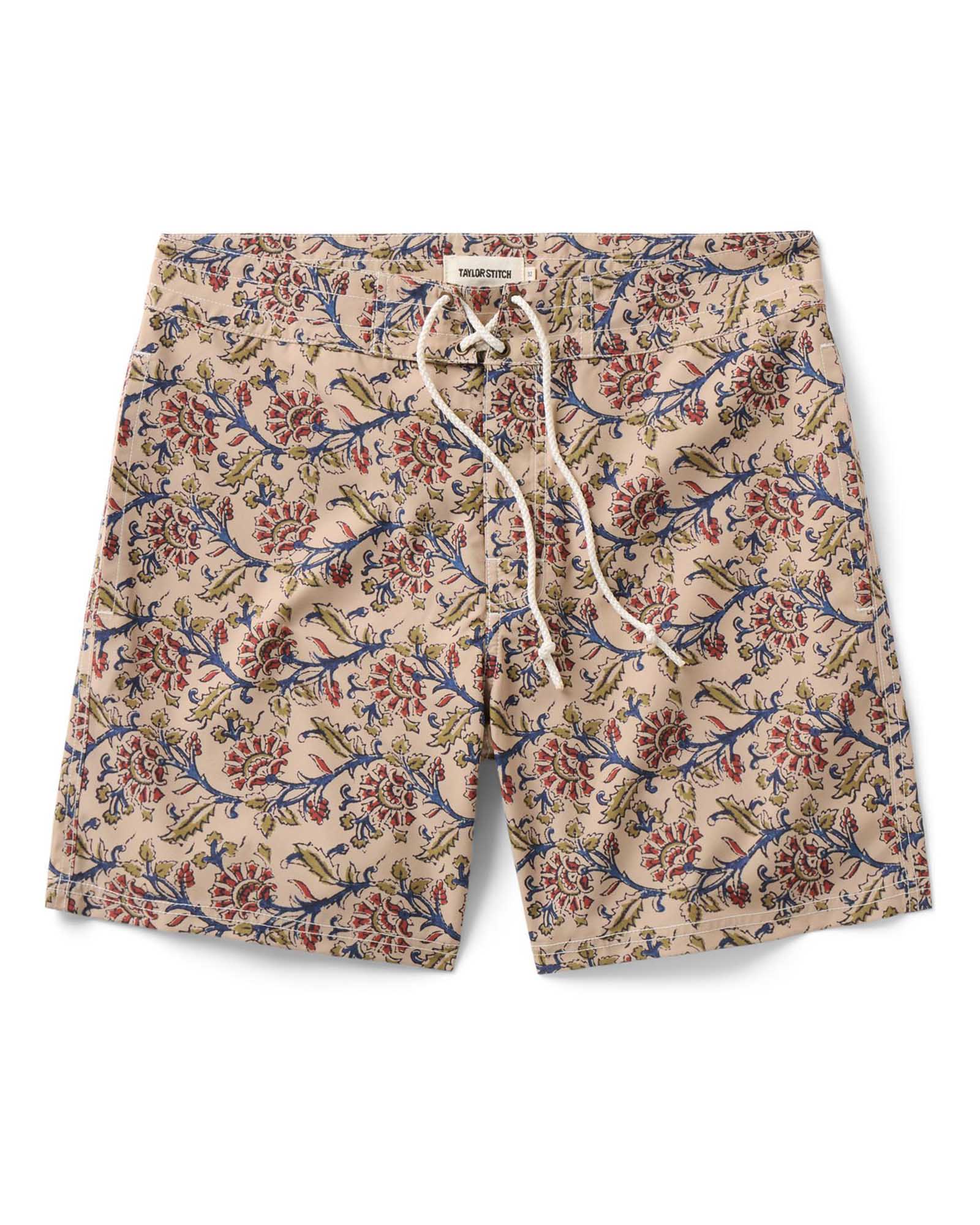 flatlay of The Drift Boardshort in Ivory Floral, Bottoms by Taylor Stitch