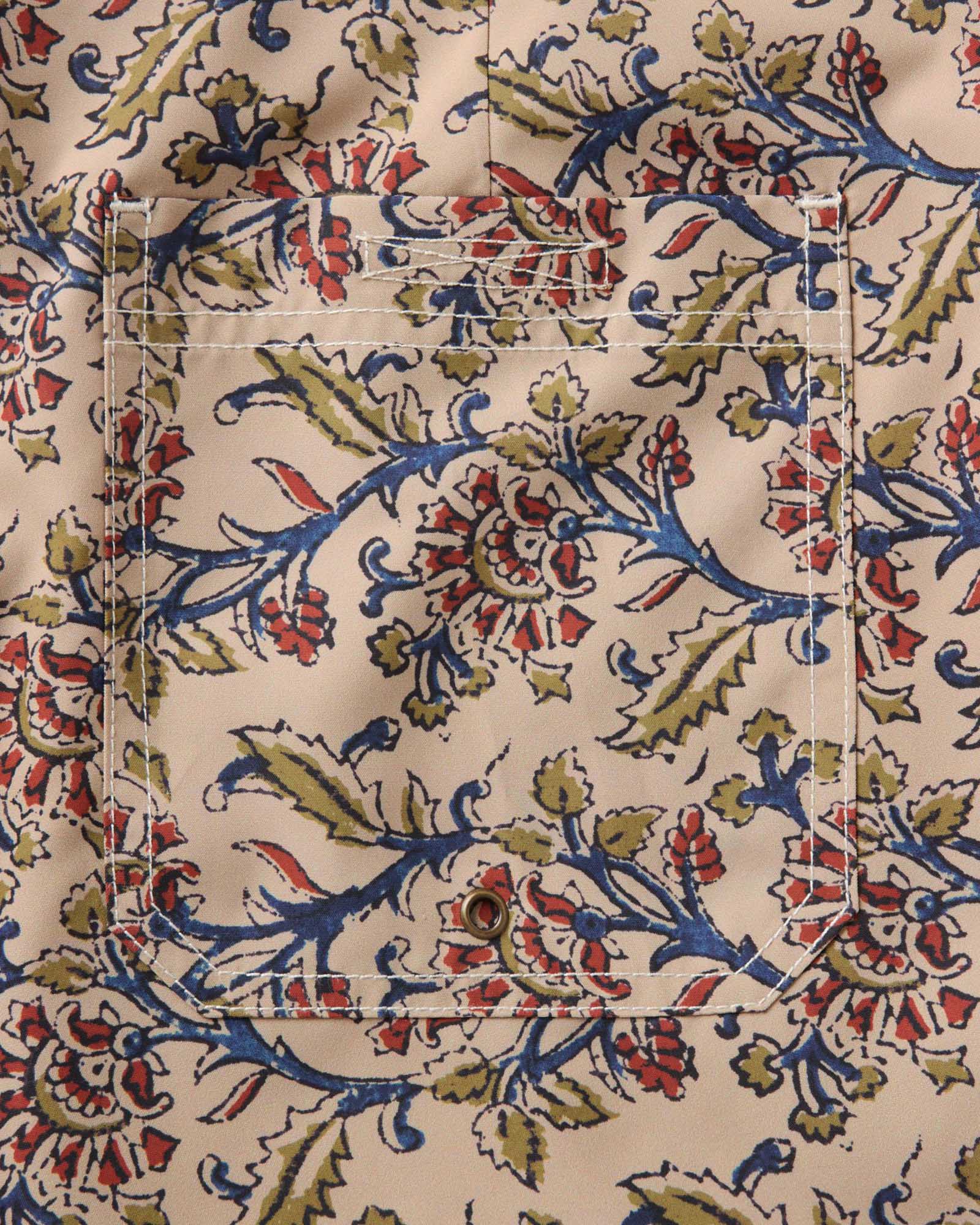 material shot of the pocket on The Drift Boardshort in Ivory Floral, Bottoms by Taylor Stitch