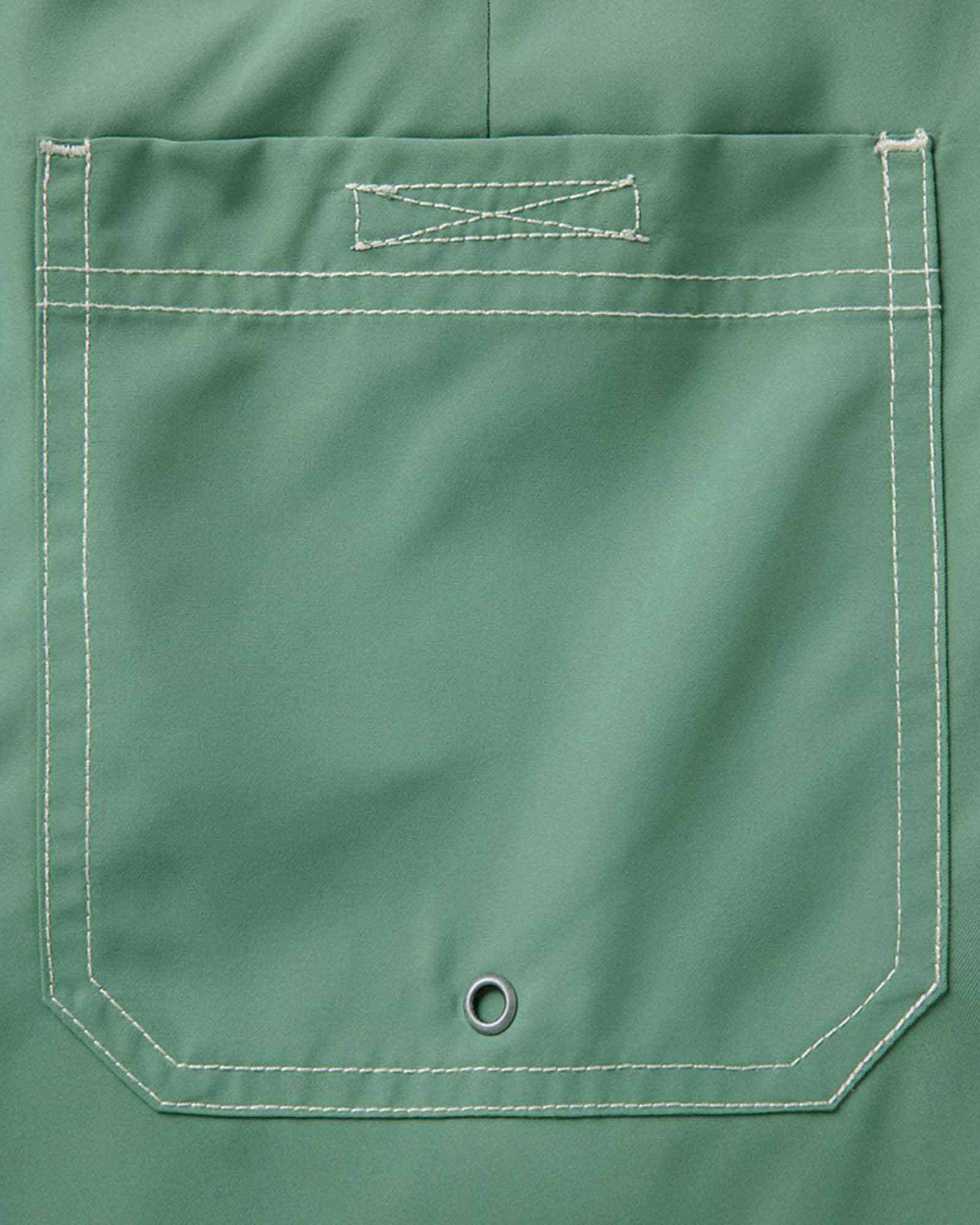 material shot of the back pocket on The Drift Boardshort in Ivy, Bottoms by Taylor Stitch