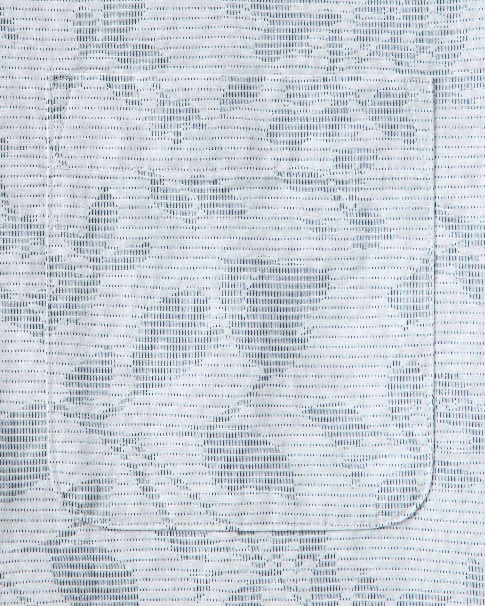 material shot of the pocket on The Hawthorne Shirt in Sky Blue Floral Jacquard, Wovens by Taylor Stitch