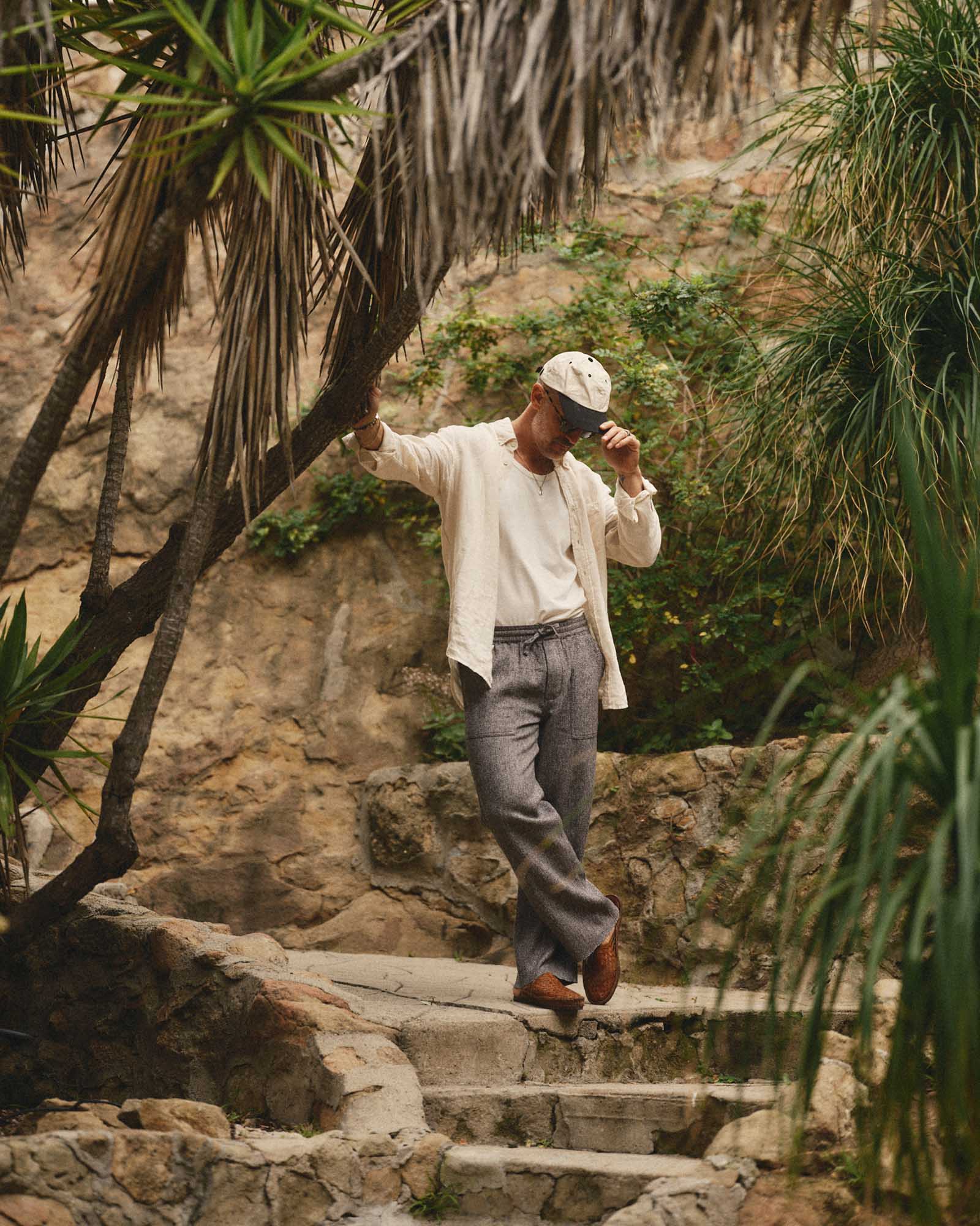fit model posing in The Jack in Vintage White Linen, Wovens by Taylor Stitch