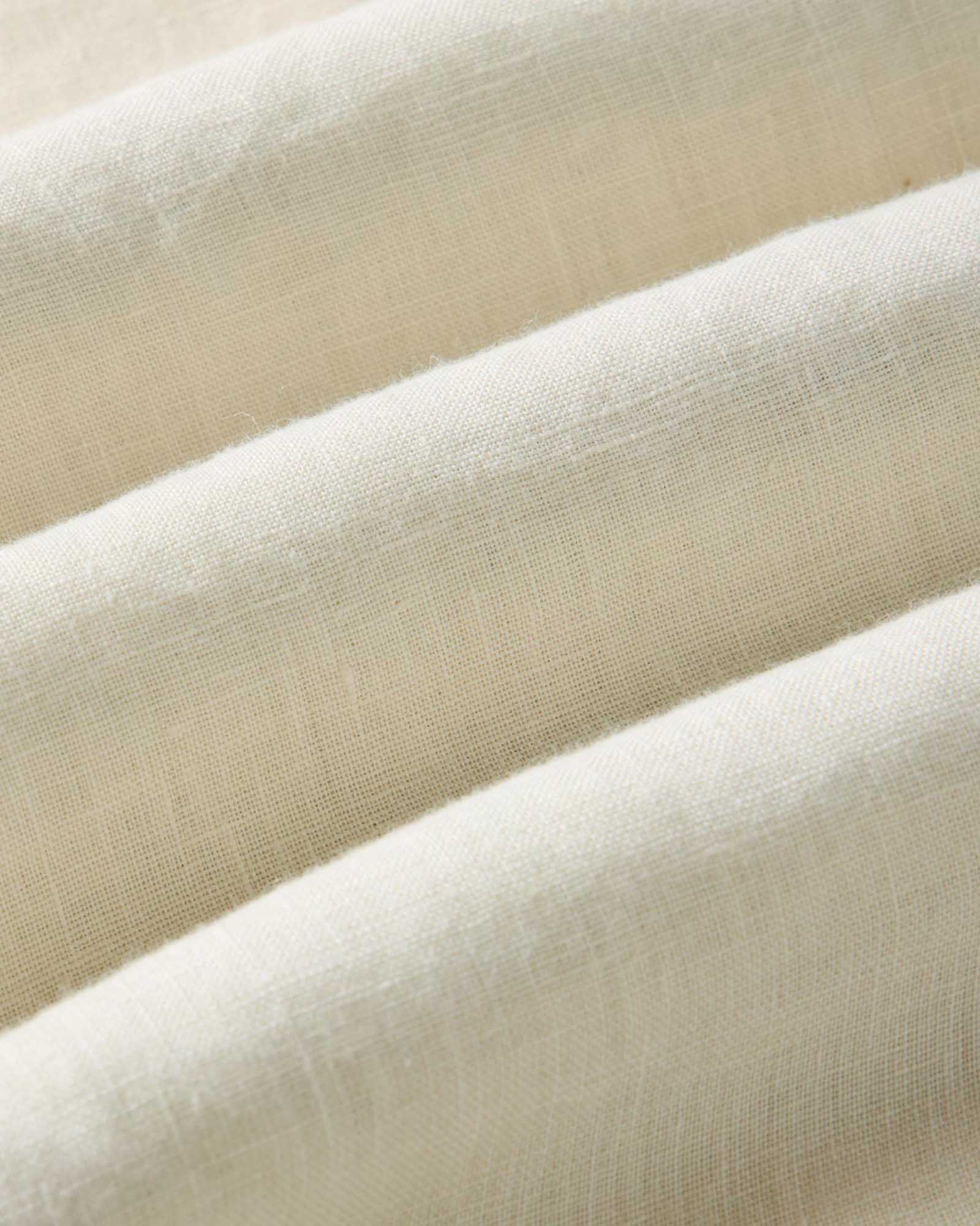 material shot of the fabric on The Jack in Vintage White Linen, Wovens by Taylor Stitch