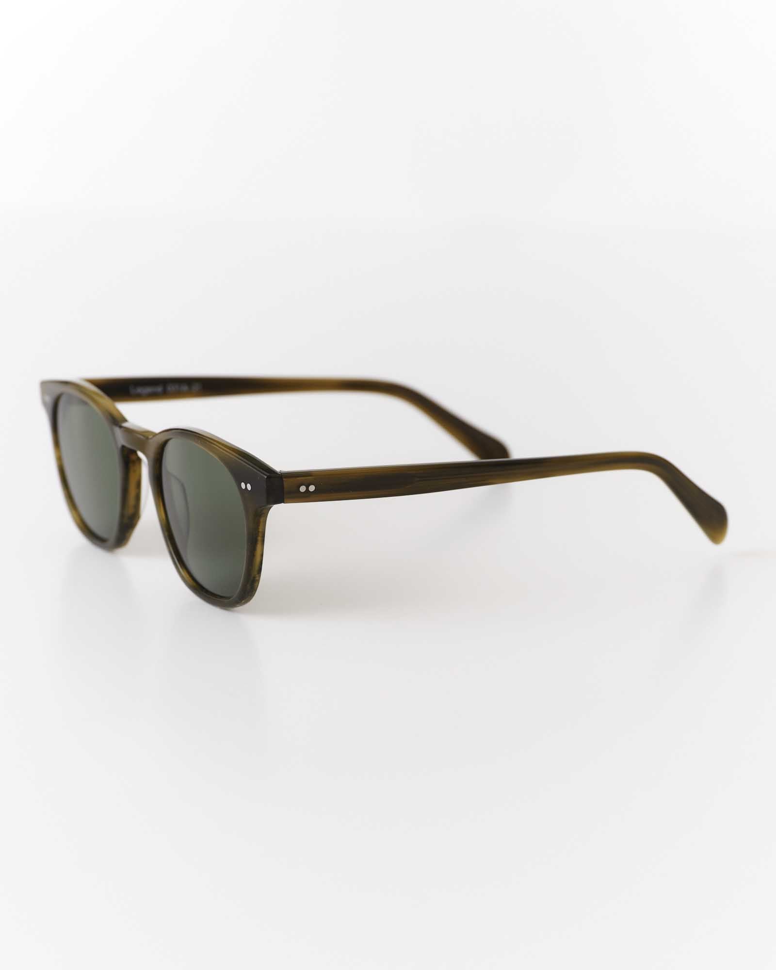 editorial image of the side of The Legend in Green Tortoise, Accessories by Taylor Stitch
