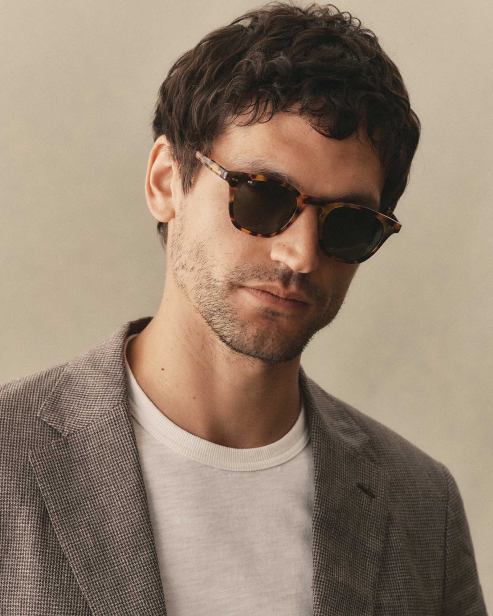 fit model posing in The Legend in Tokyo Tortoise, Accessories by Taylor Stitch