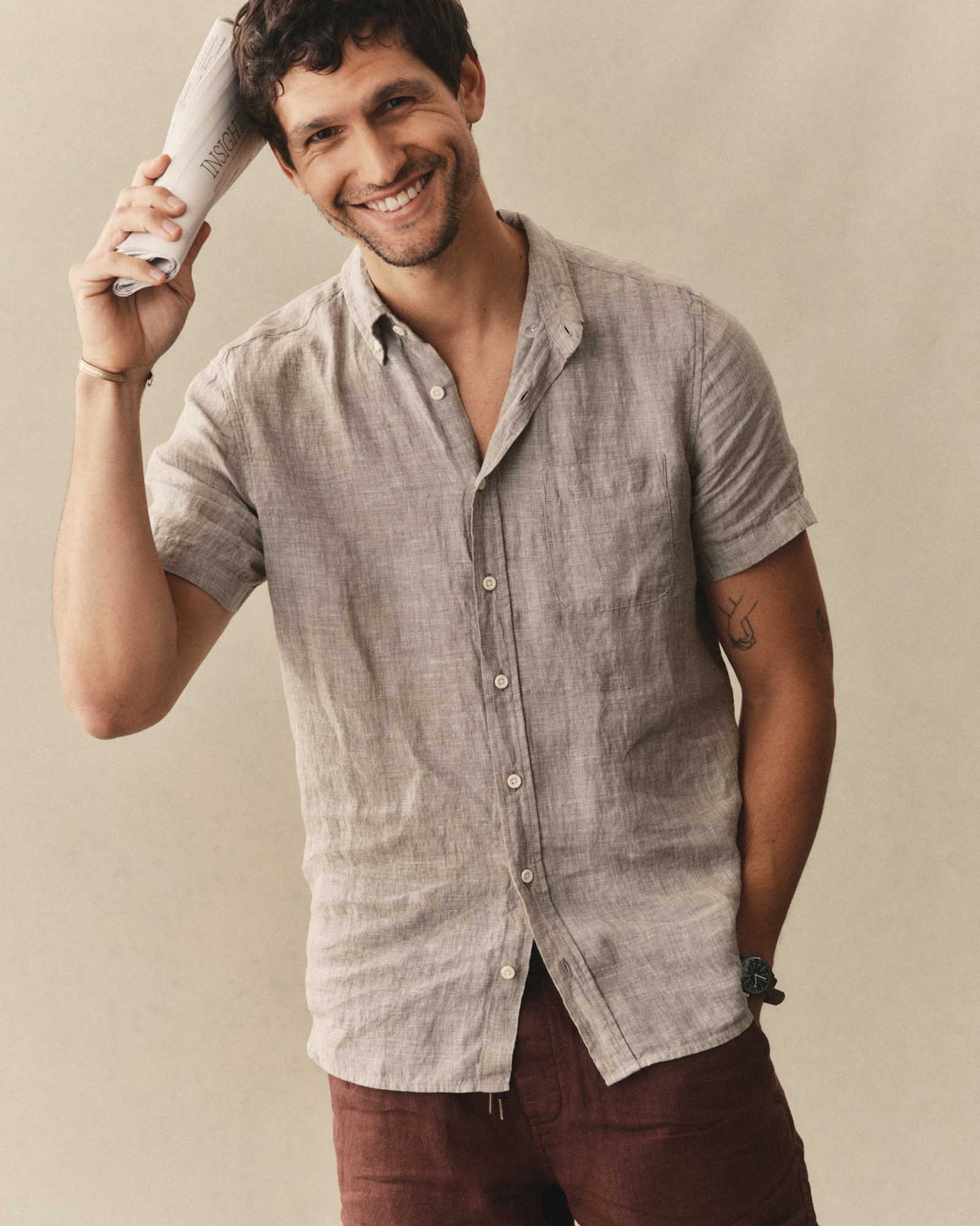 fit model posing in The Short Sleeve Jack in Sage Linen, Wovens by Taylor Stitch