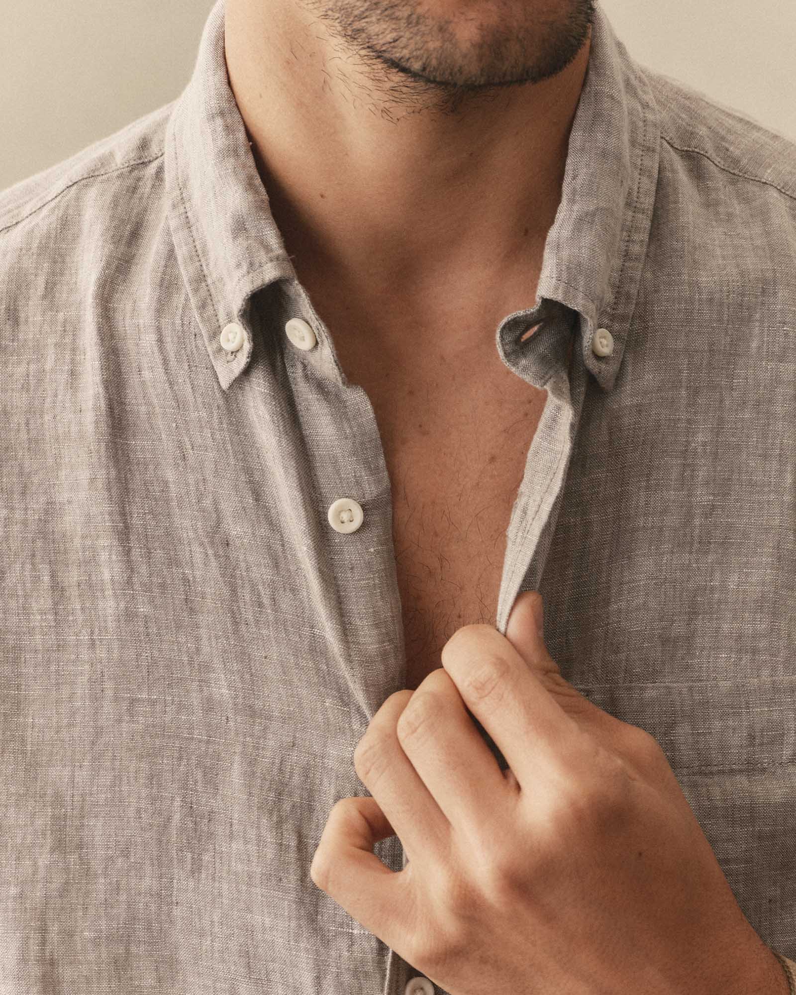 fit model showing off the collar on The Short Sleeve Jack in Sage Linen, Wovens by Taylor Stitch