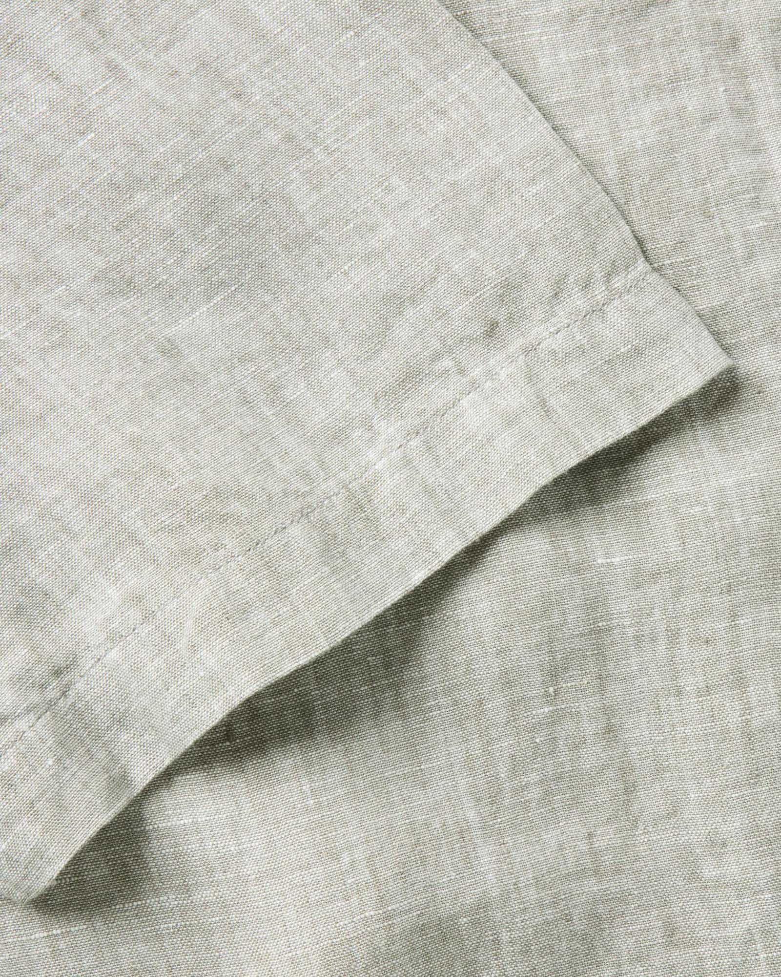 material shot of the sleeve on The Short Sleeve Jack in Sage Linen, Wovens by Taylor Stitch