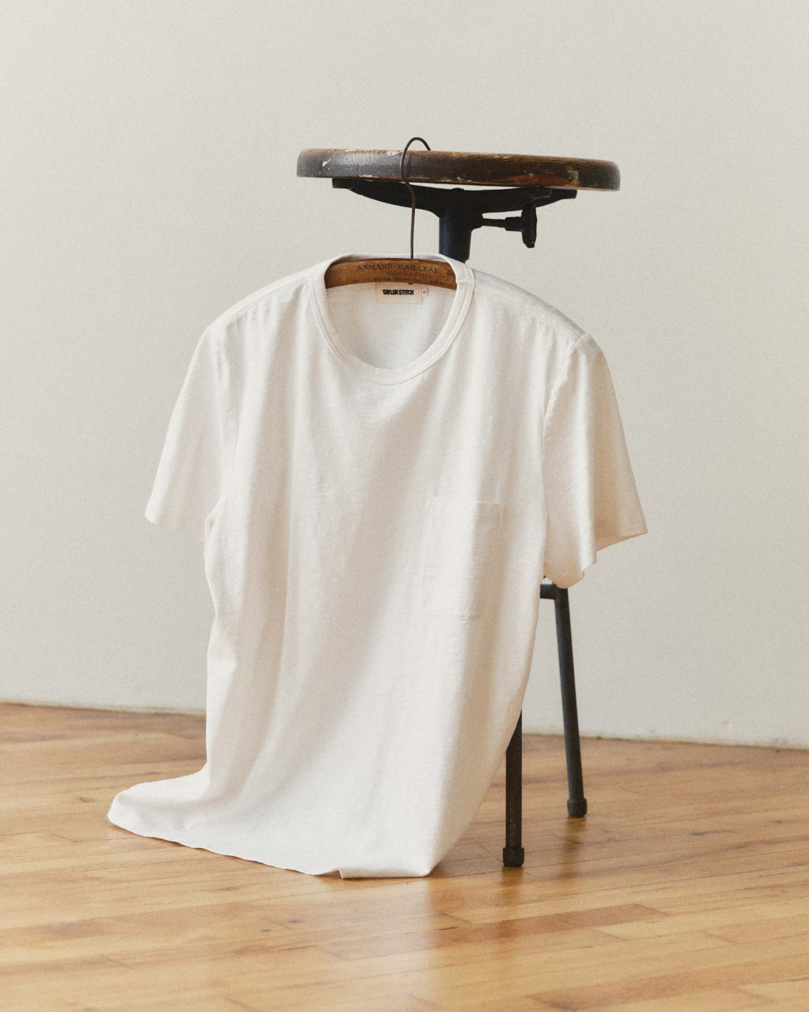 editorial image of The Slub Tee in White hanging, Knits by Taylor Stitch