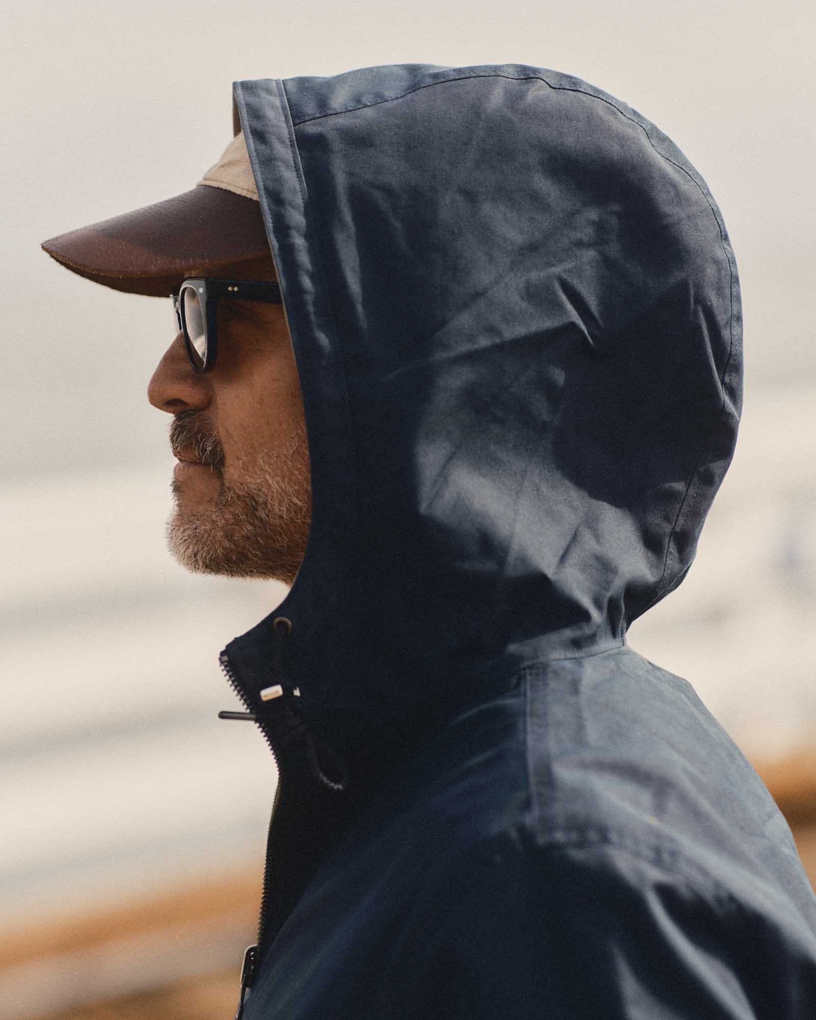 fit model showing off the hood on The Squall Anorak in Navy Twill, Outerwear by Taylor Stitch