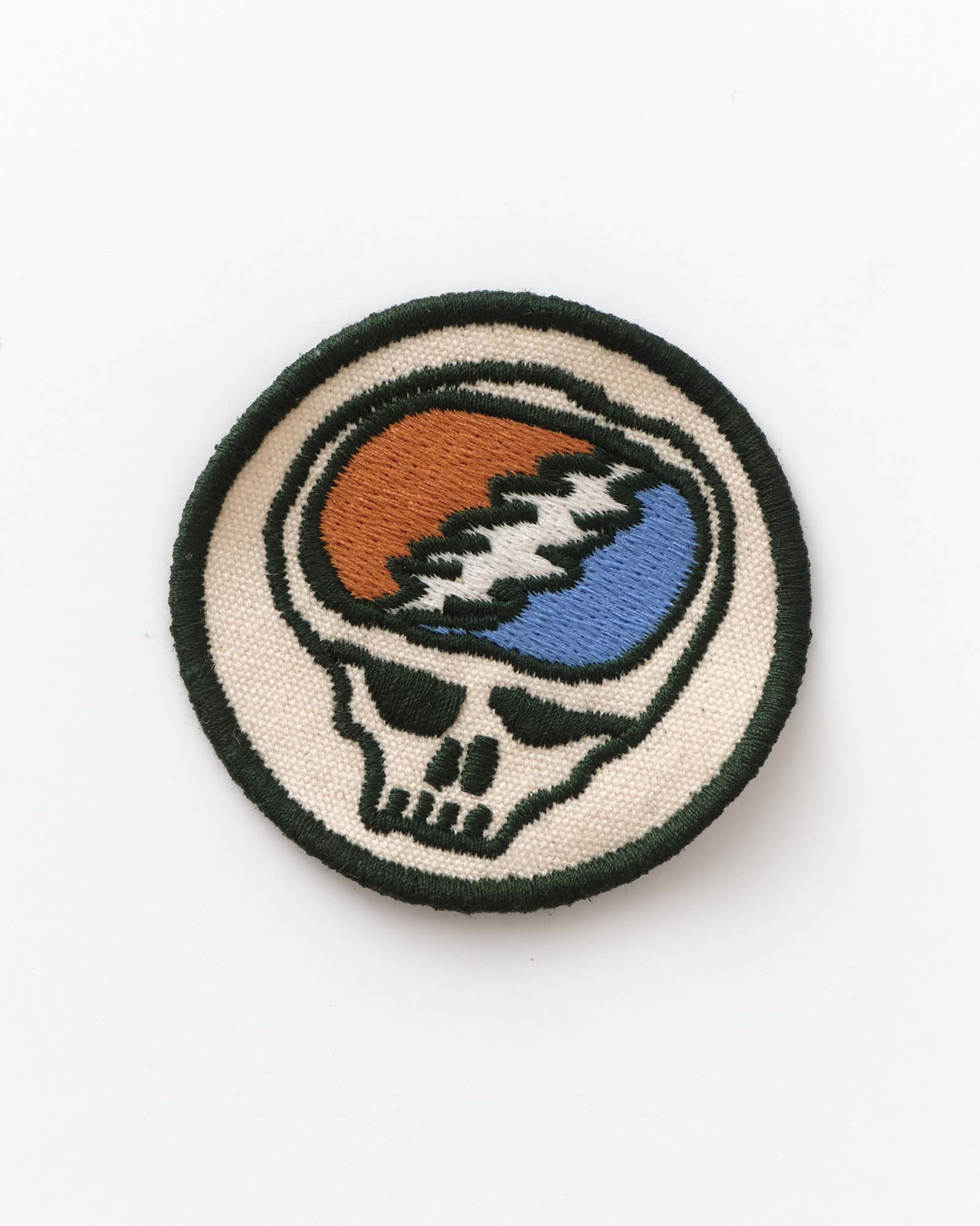 Round patch with a skull design on a white background, Accessories by Taylor Stitch