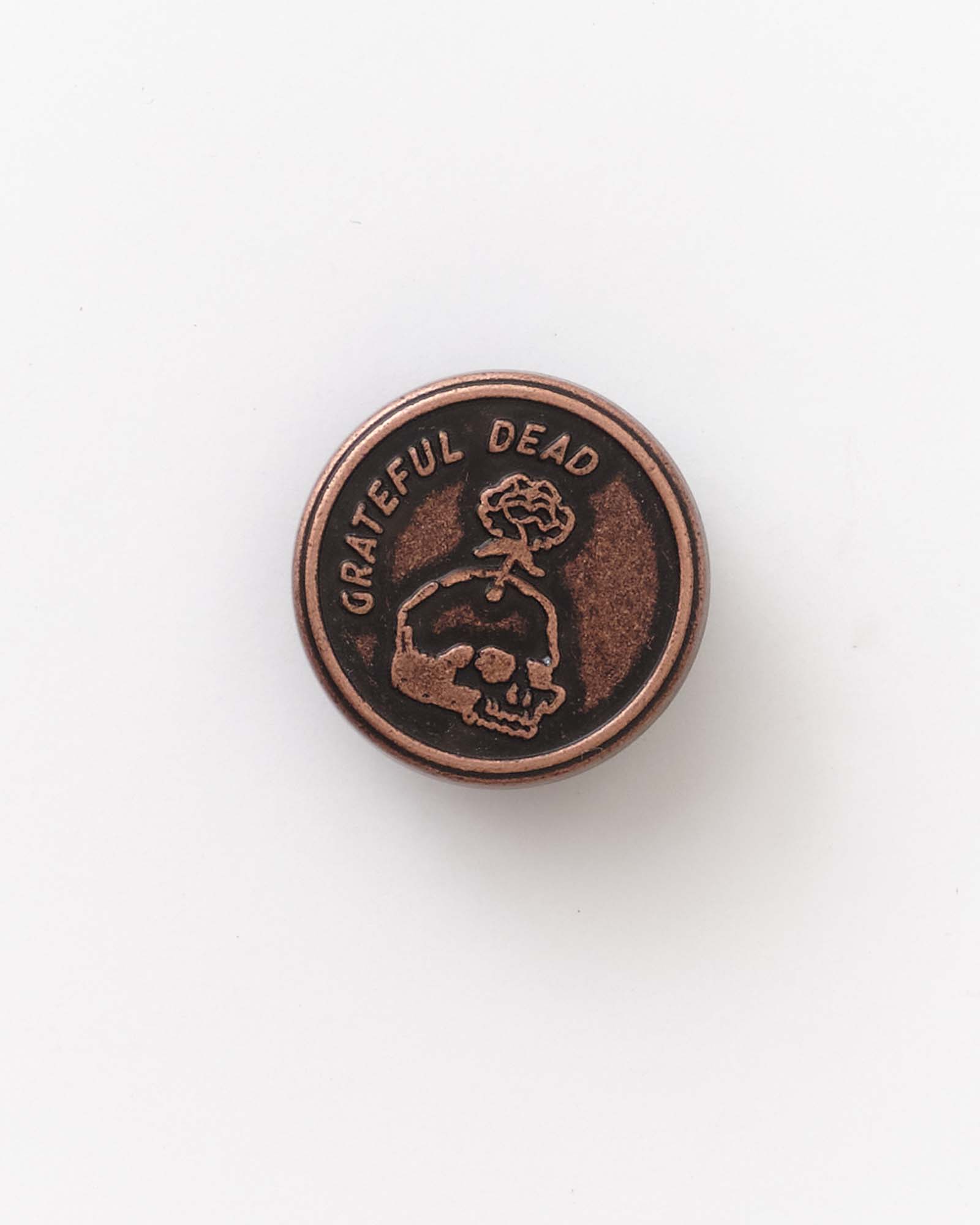 flatlay of grateful dead pin for The Magoo’s Pin Set, Accessories by Taylor Stitch