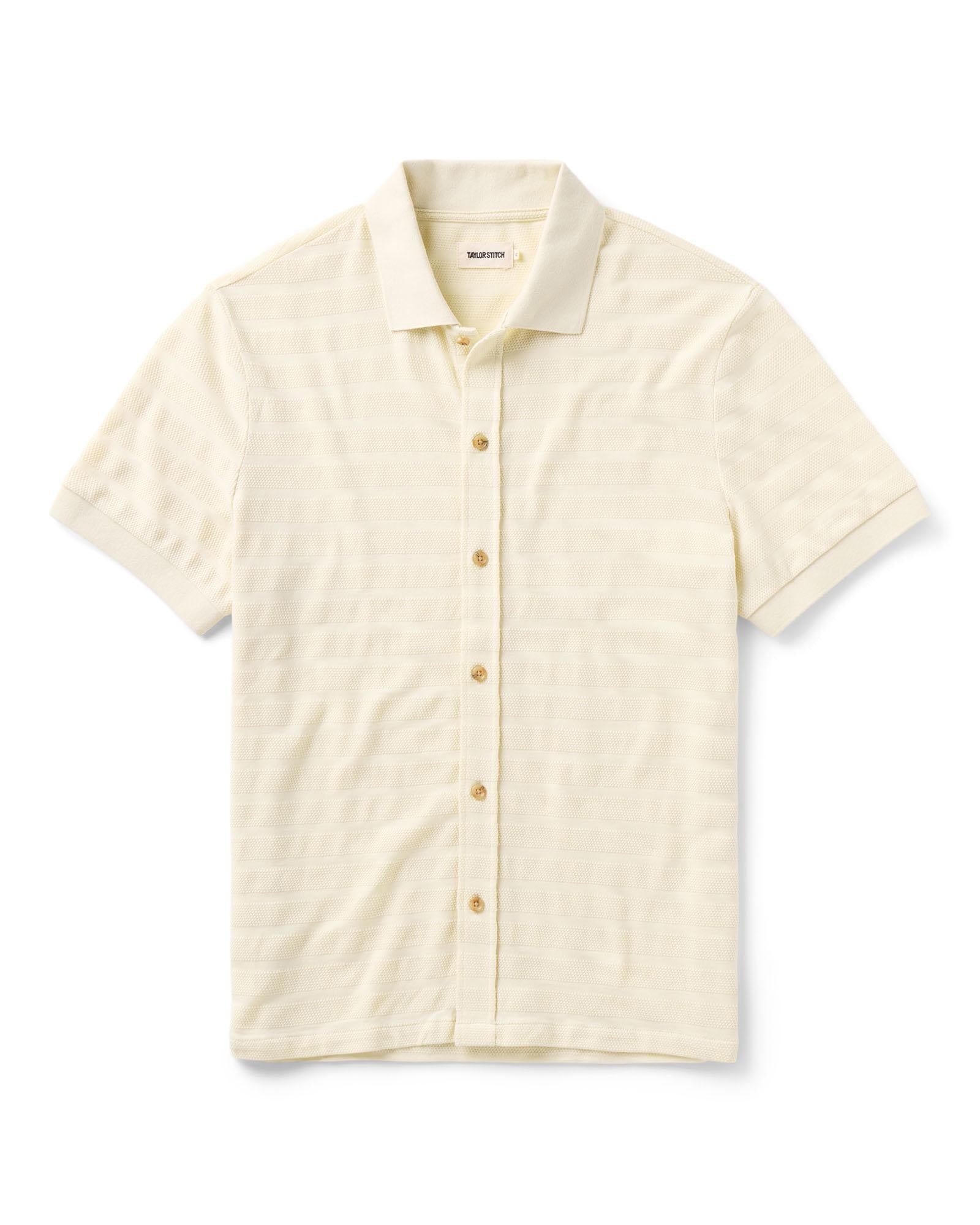 flatlay of The Bywater Polo in Natural Knit Stripe, Knits by Taylor Stitch