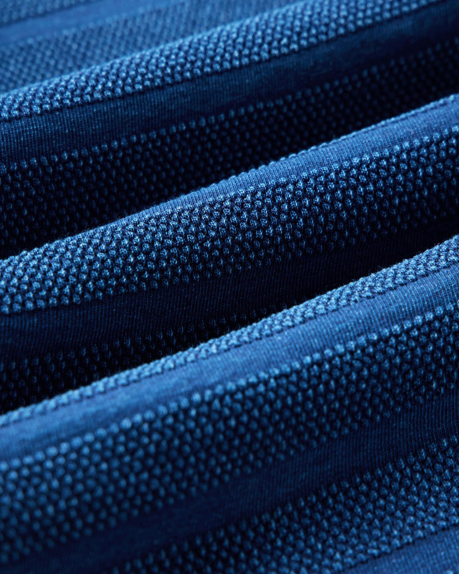 material shot of the fabric on The Bywater Polo in Rinsed Indigo Knit Stripe, Knits by Taylor Stitch