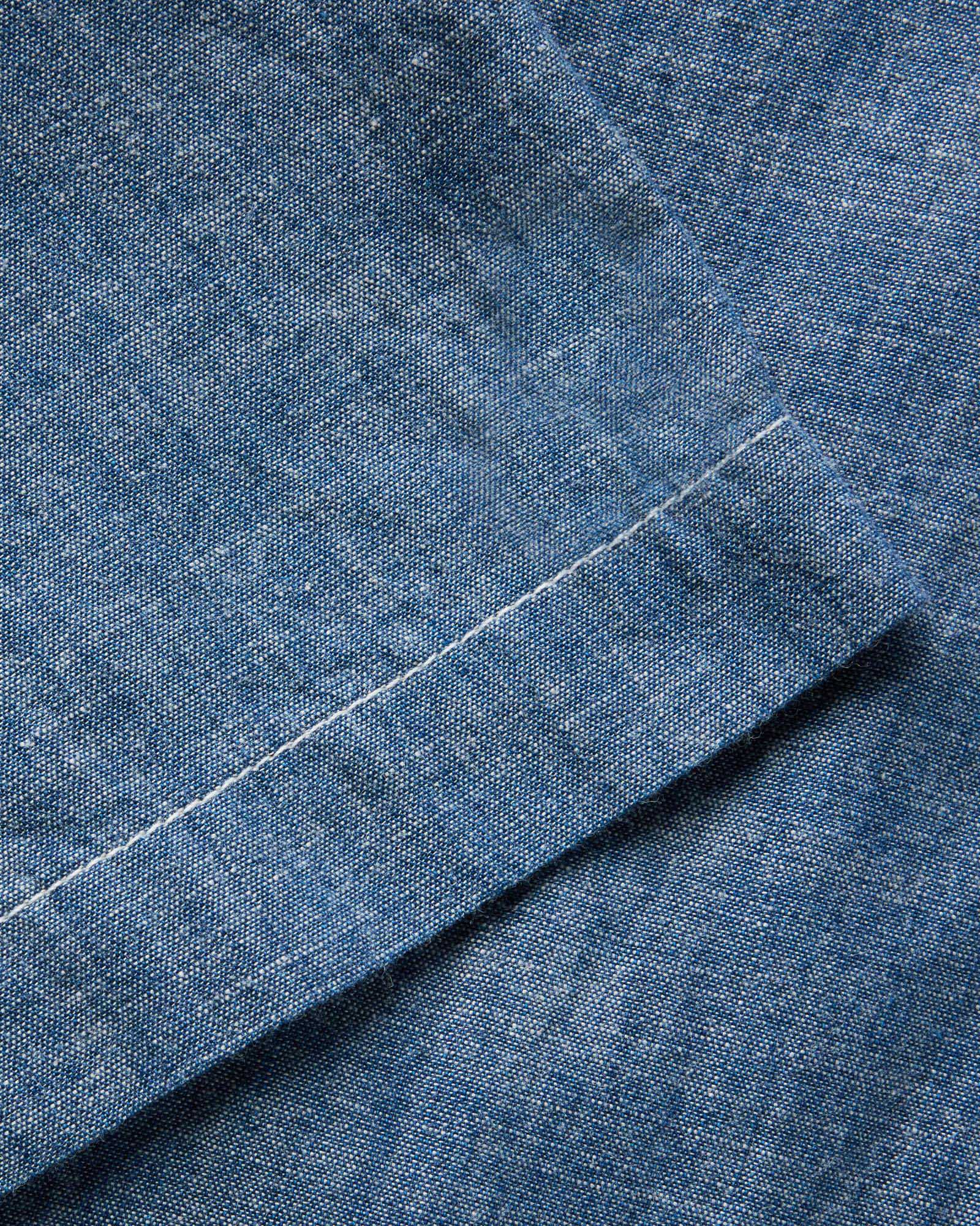 material shot of the sleeve on The Short Sleeve Crew Shirt in Washed Indigo Chambray, Wovens by Taylor Stitch