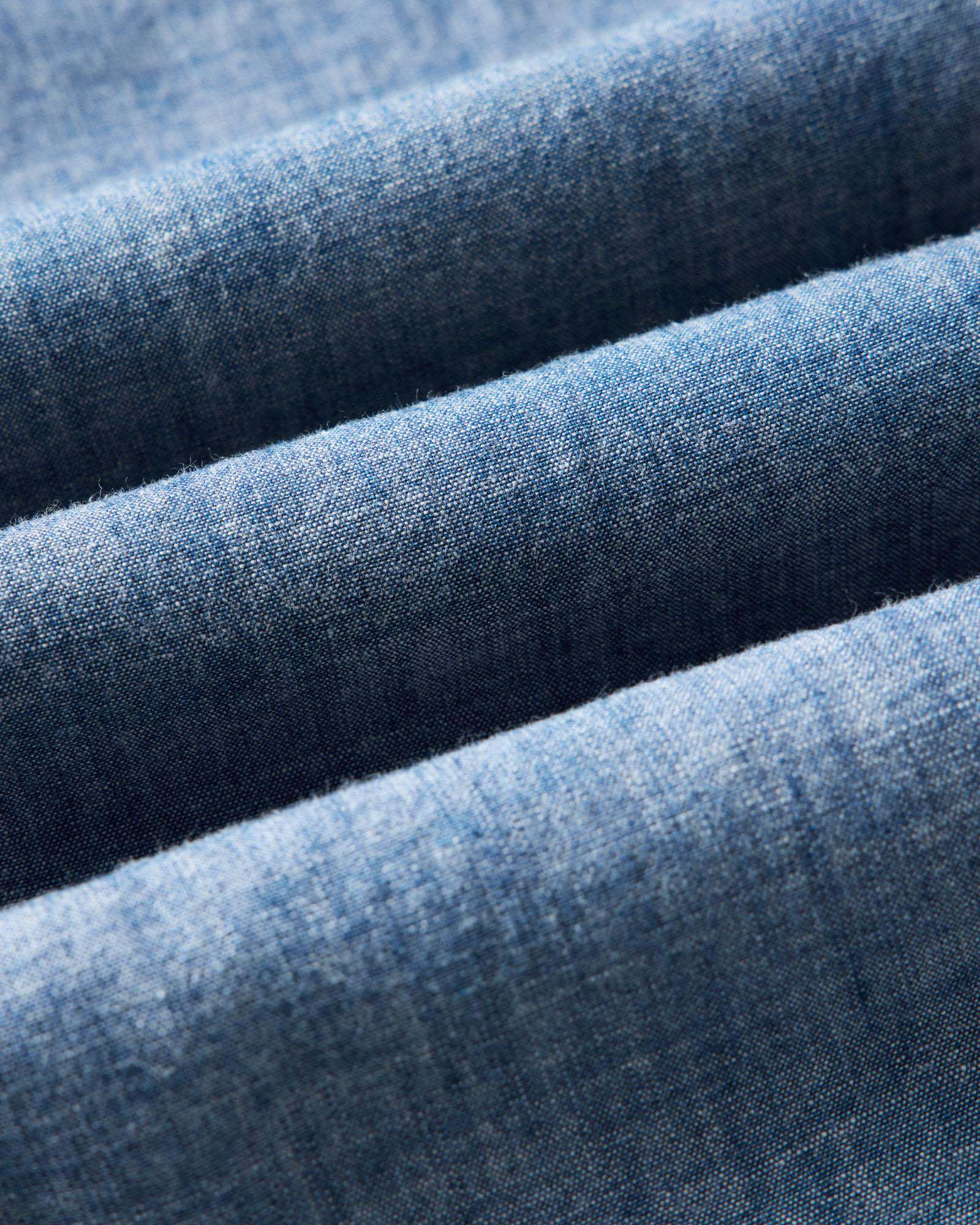 material shot of the fabric on The Short Sleeve Crew Shirt in Washed Indigo Chambray, Wovens by Taylor Stitch