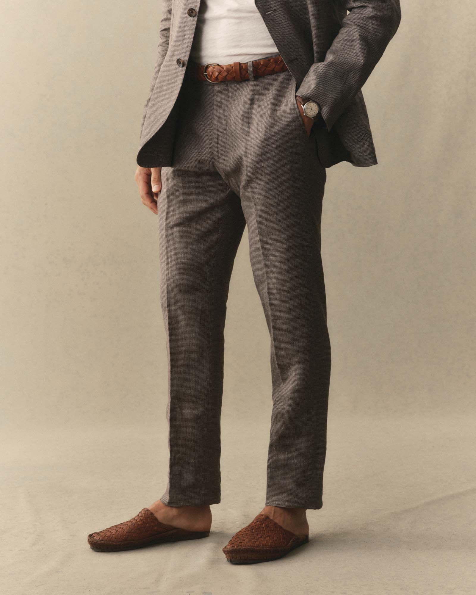 fit model posing in The Stevens Trouser in Morel Micro Check, Bottoms by Taylor Stitch