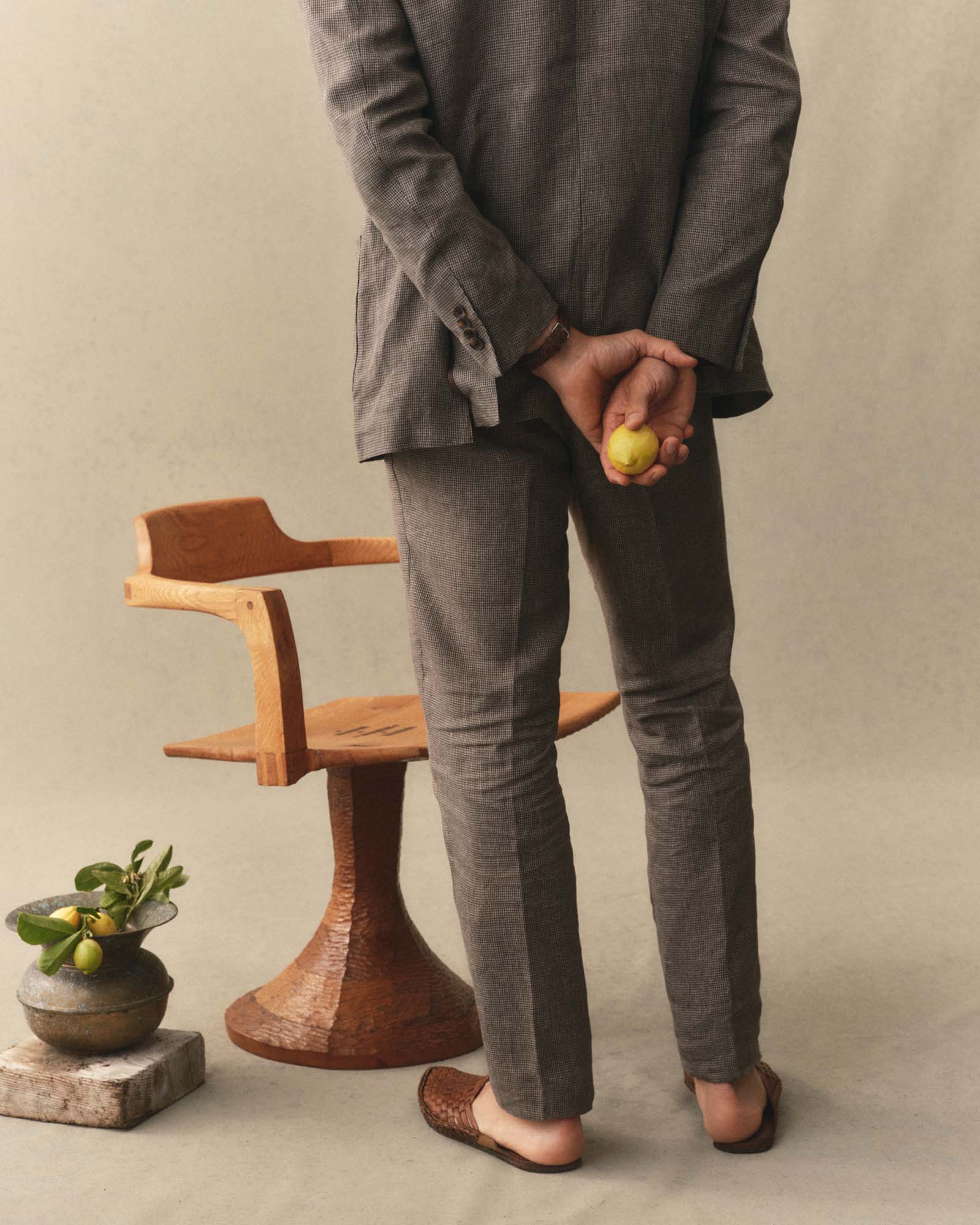 fit model showing off the back of The Stevens Trouser in Morel Micro Check, Bottoms by Taylor Stitch