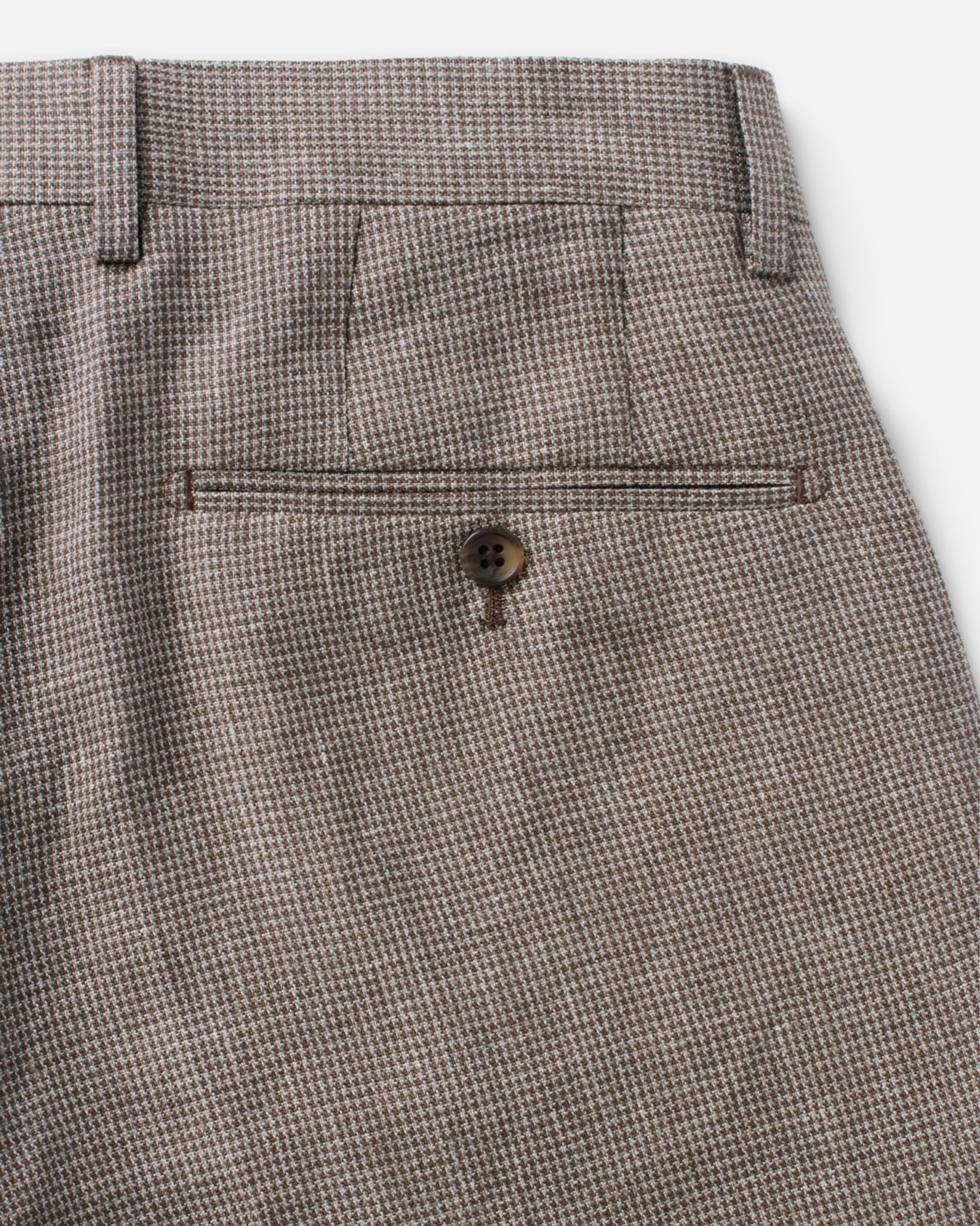 material shot of the back pocket on The Stevens Trouser in Morel Micro Check, Bottoms by Taylor Stitch