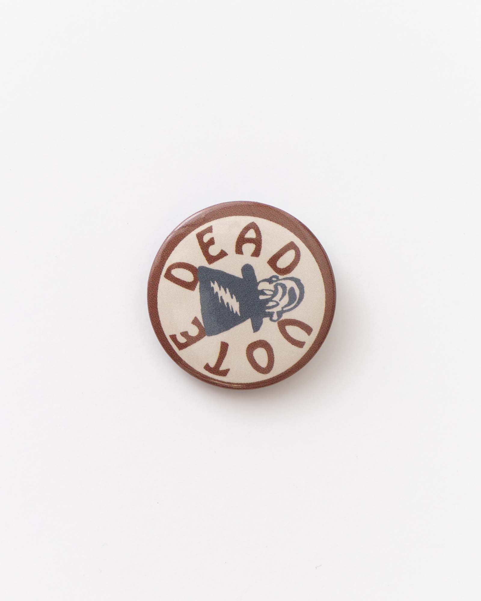 flatlay of vote dead pin for The Acid Test Pin Set, Accessories by Taylor Stitch