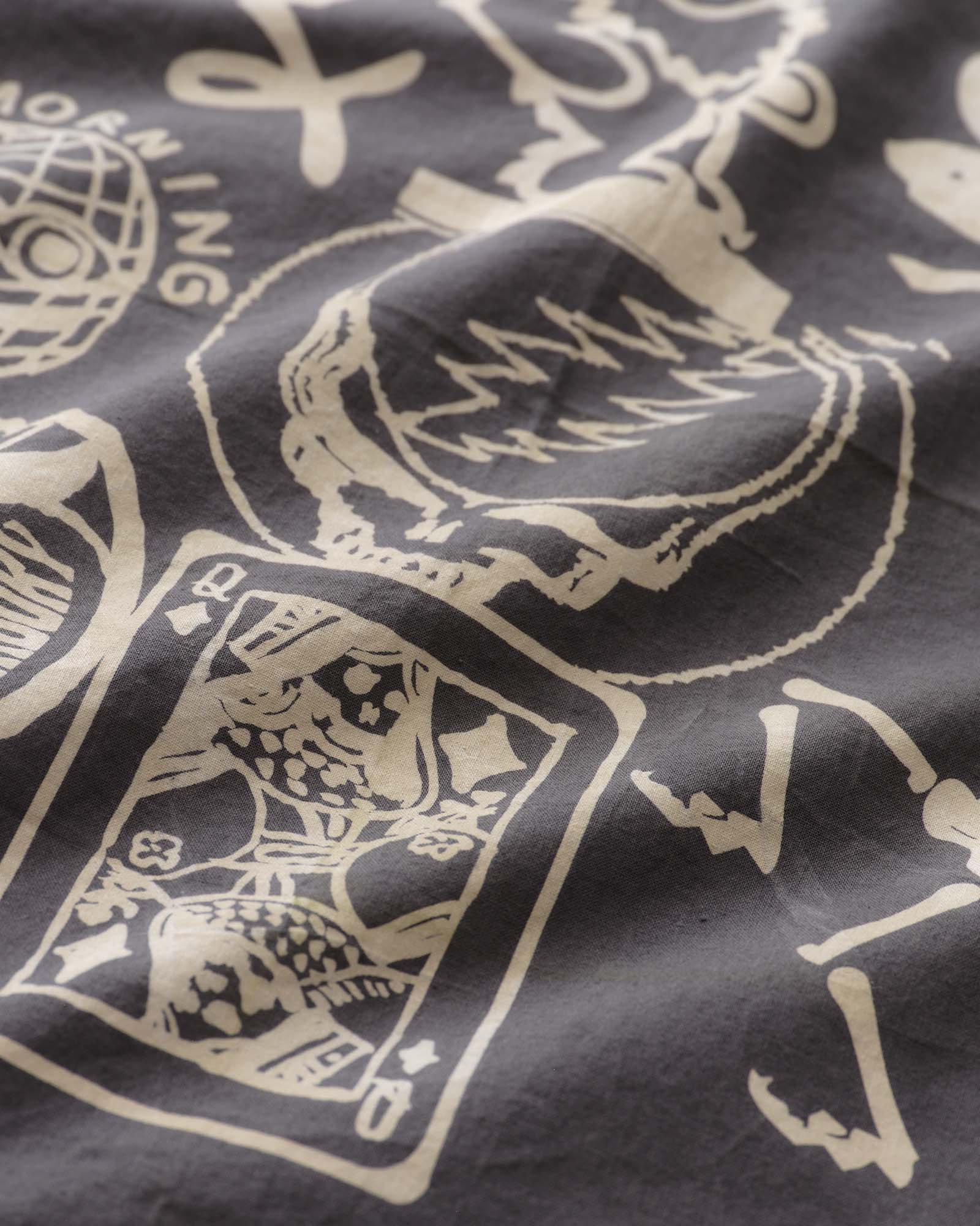 material shot of the fabric on The Bandana in Faded Black Stamp, Accessories by Taylor Stitch