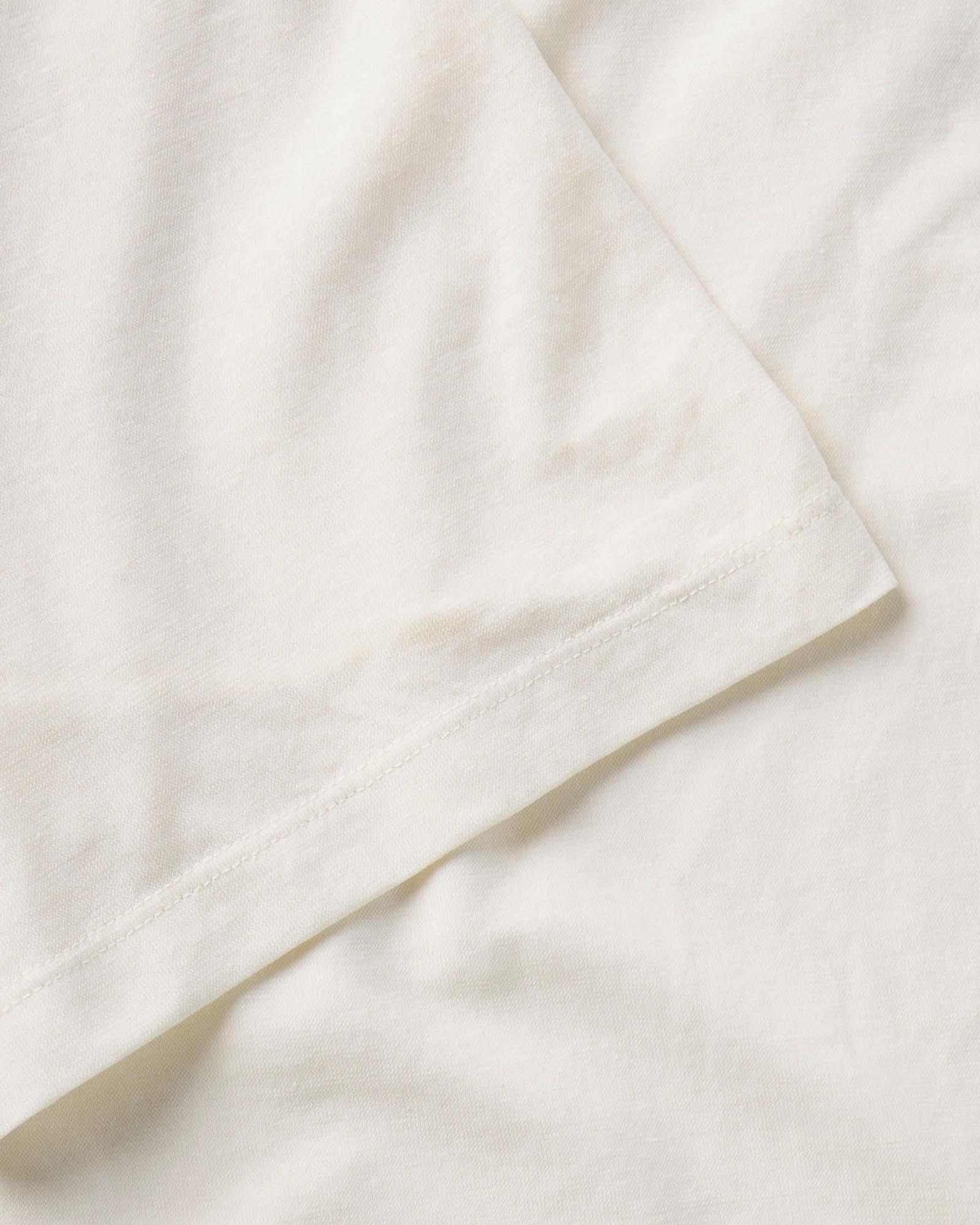 material shot of the sleeve on The Cotton Hemp Polo in Vintage White, Knits by Taylor Stitch