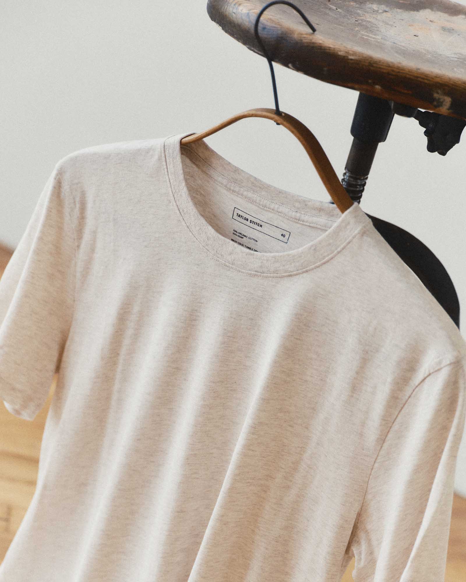 editorial image of The Cotton Hemp Tee in Heather Oat hanging, Knits by Taylor Stitch