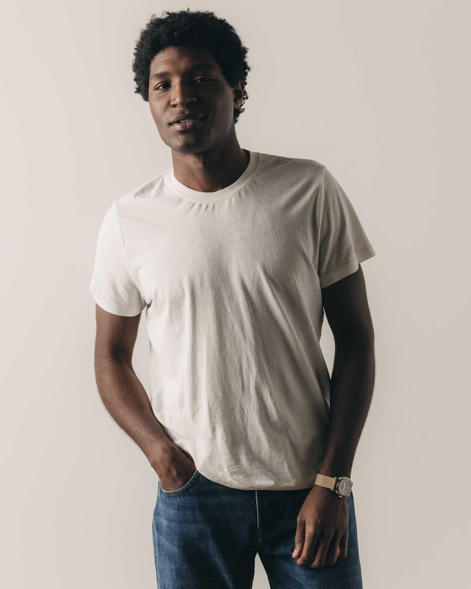 fit model posing in The Cotton Hemp Tee in Vintage White, Knits by Taylor Stitch