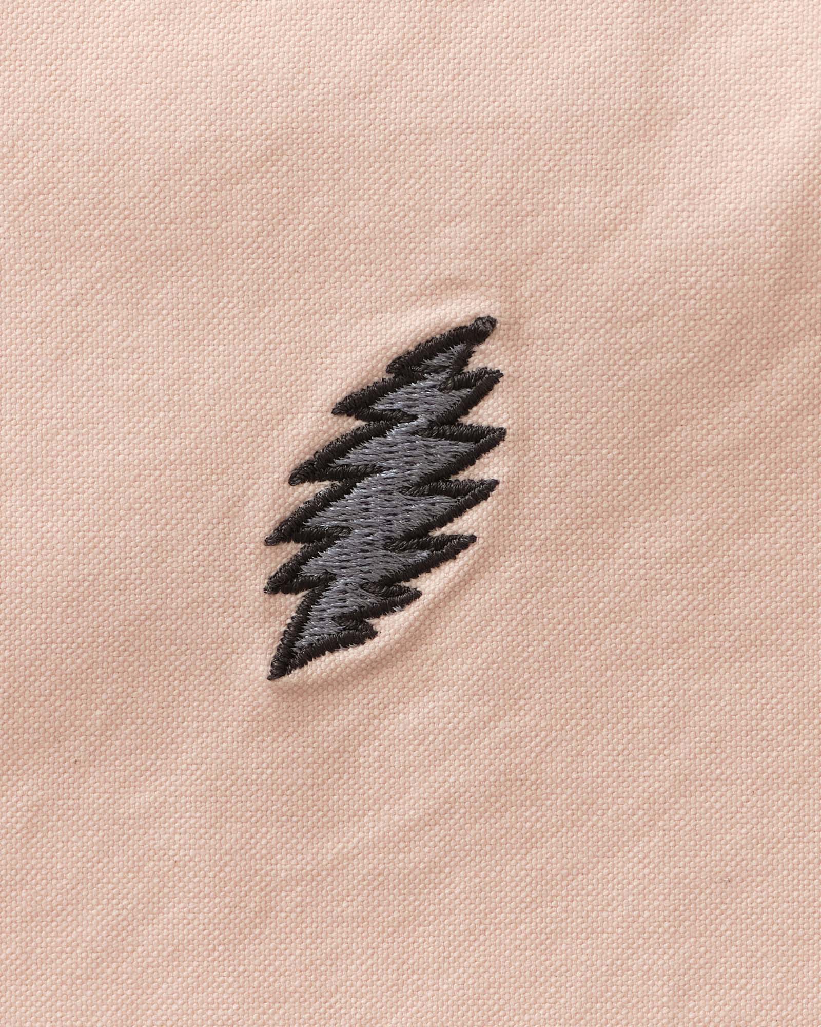 material shot of the patch on The Stageworn Jack in Pale Rose Oxford, Wovens by Taylor Stitch