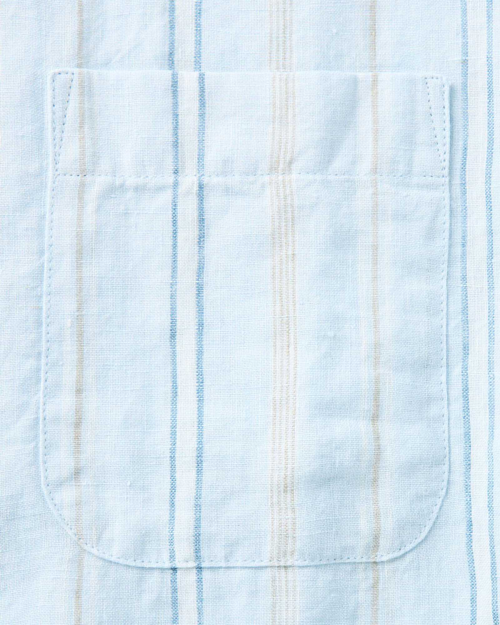 material shot of the pocket on The Jack in Blue Sky Stripe Linen, Wovens by Taylor Stitch