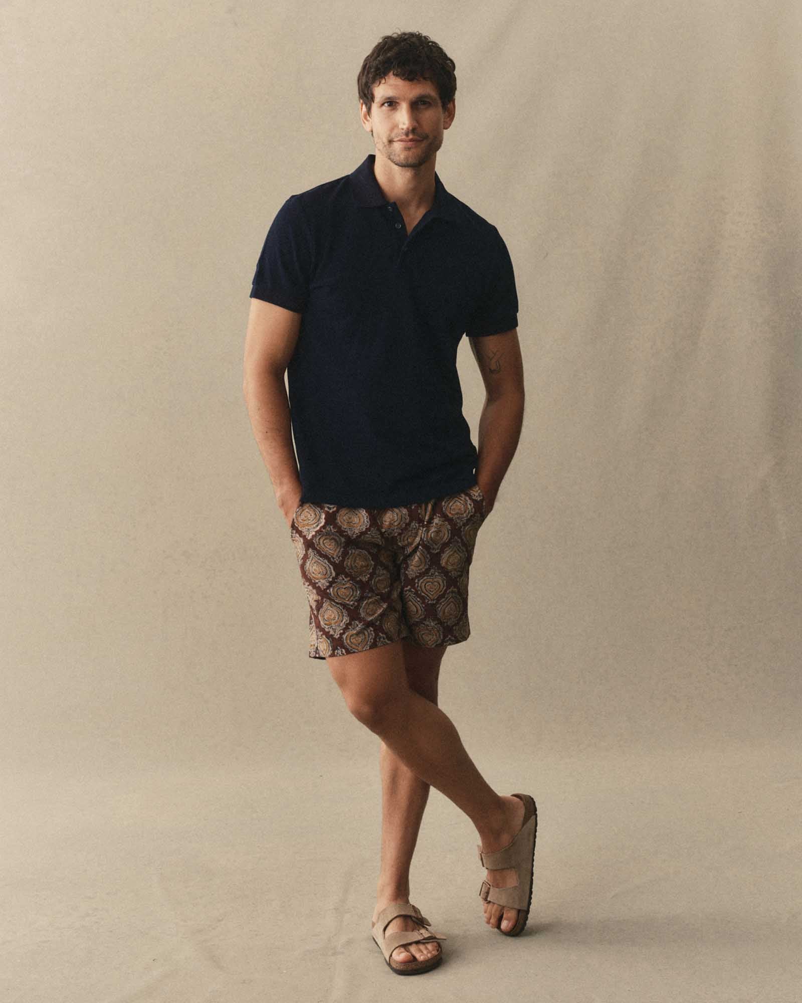 fit model wearing The Apres Short in Sangria Block Print, Bottoms by Taylor Stitch