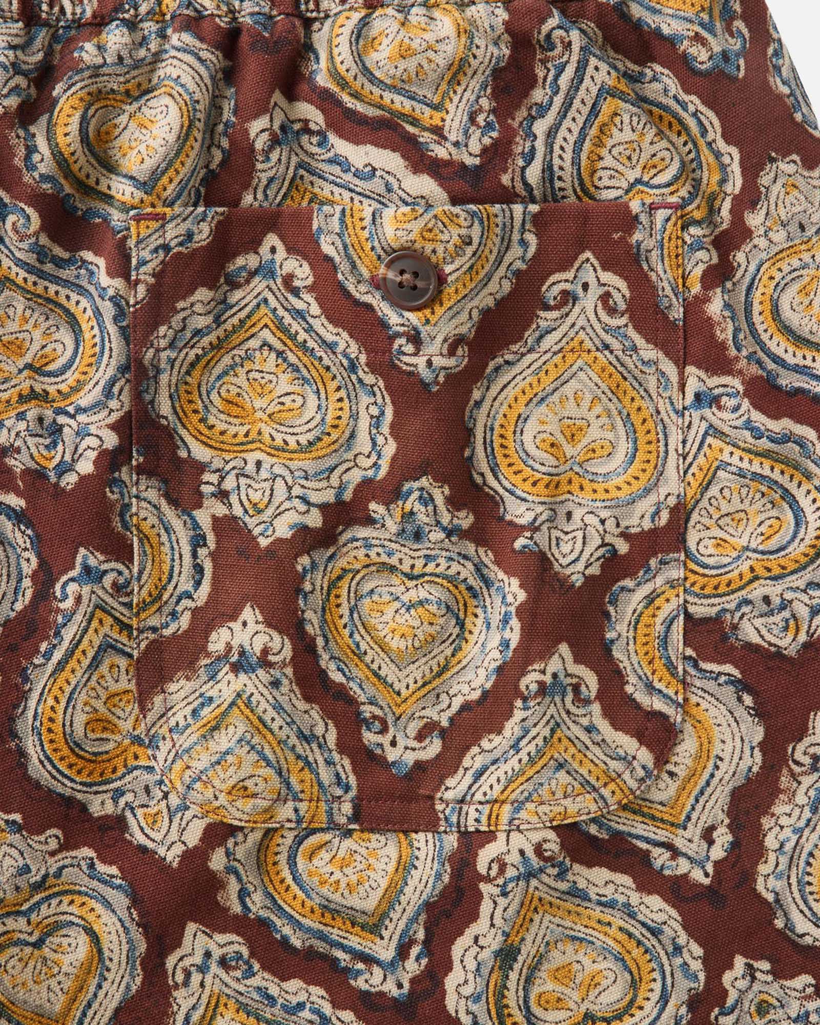 material shot of the back pocket on The Apres Short in Sangria Block Print, Bottoms by Taylor Stitch