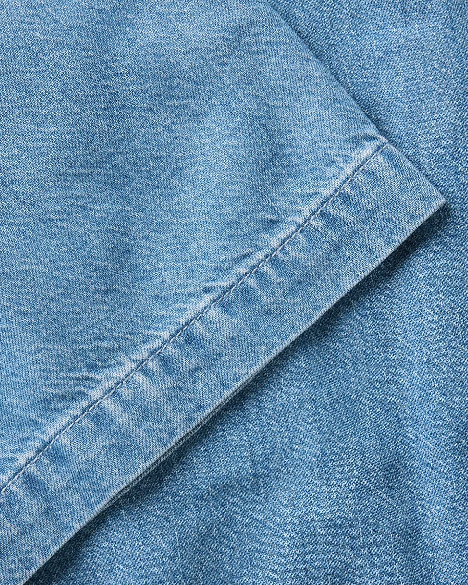 material shot of the sleeve on The Gulf Shirt in Washed Indigo Twill, Wovens by Taylor Stitch
