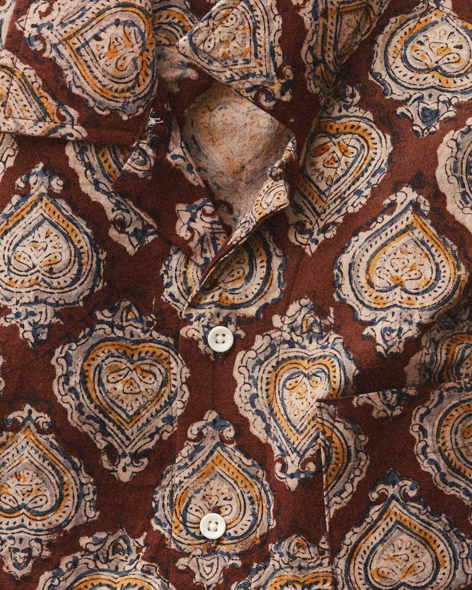 material shot of the buttons on The Hawthorne Shirt in Sangria Block Print, Wovens by Taylor Stitch