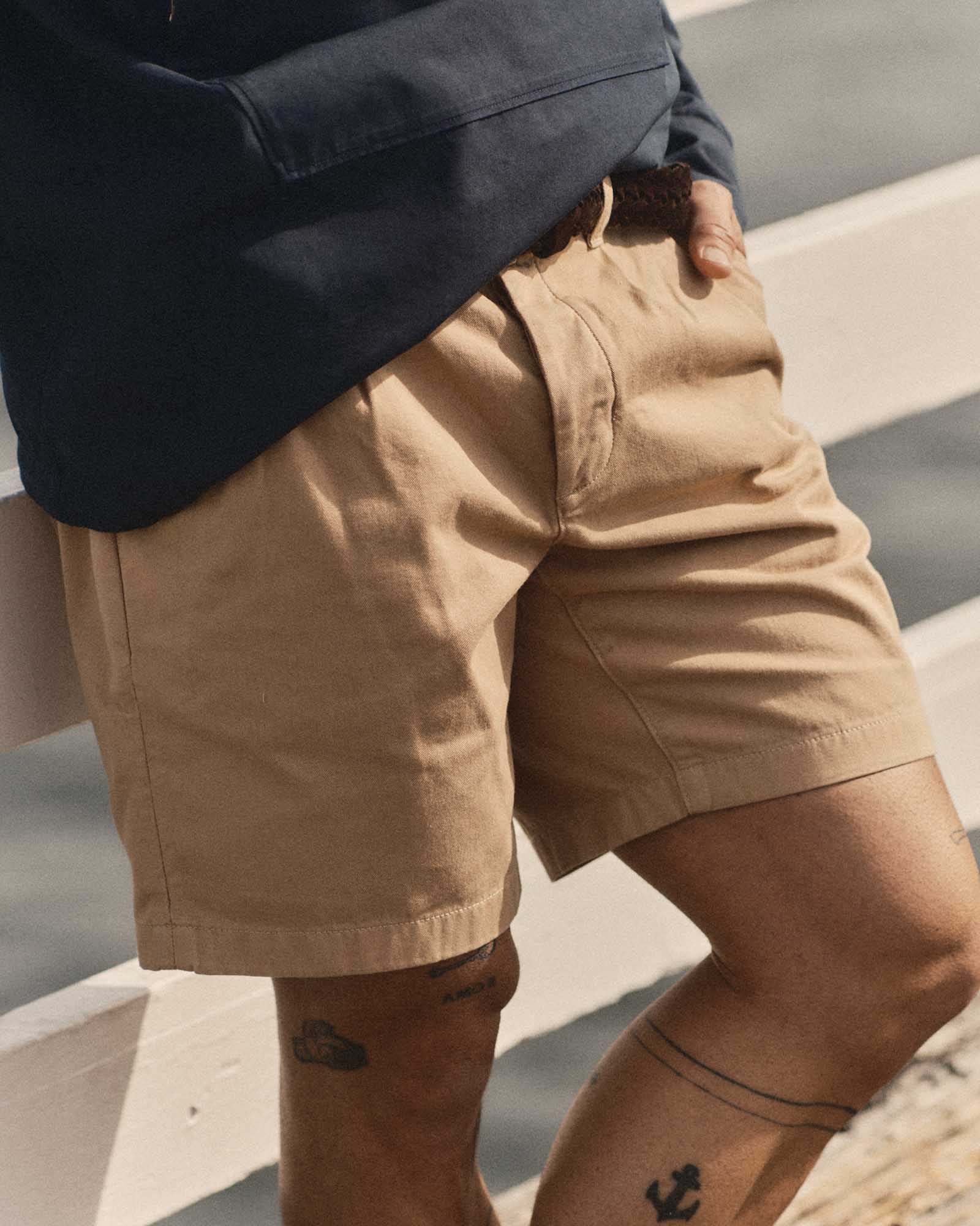 fit model showing off The Pleated Short in Organic Field Khaki Twill, Bottoms by Taylor Stitch