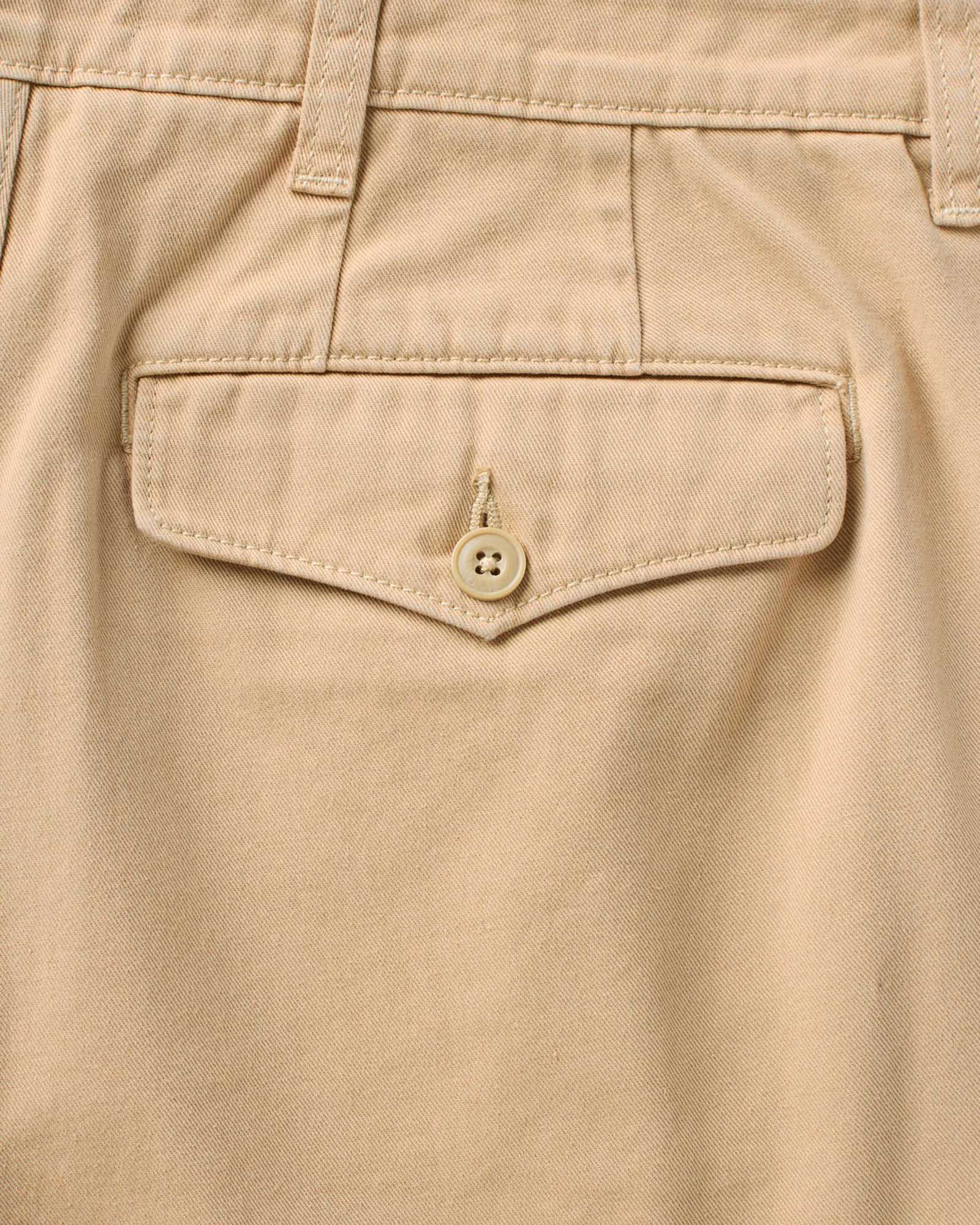 material shot of the back pocket on The Pleated Short in Organic Field Khaki Twill, Bottoms by Taylor Stitch