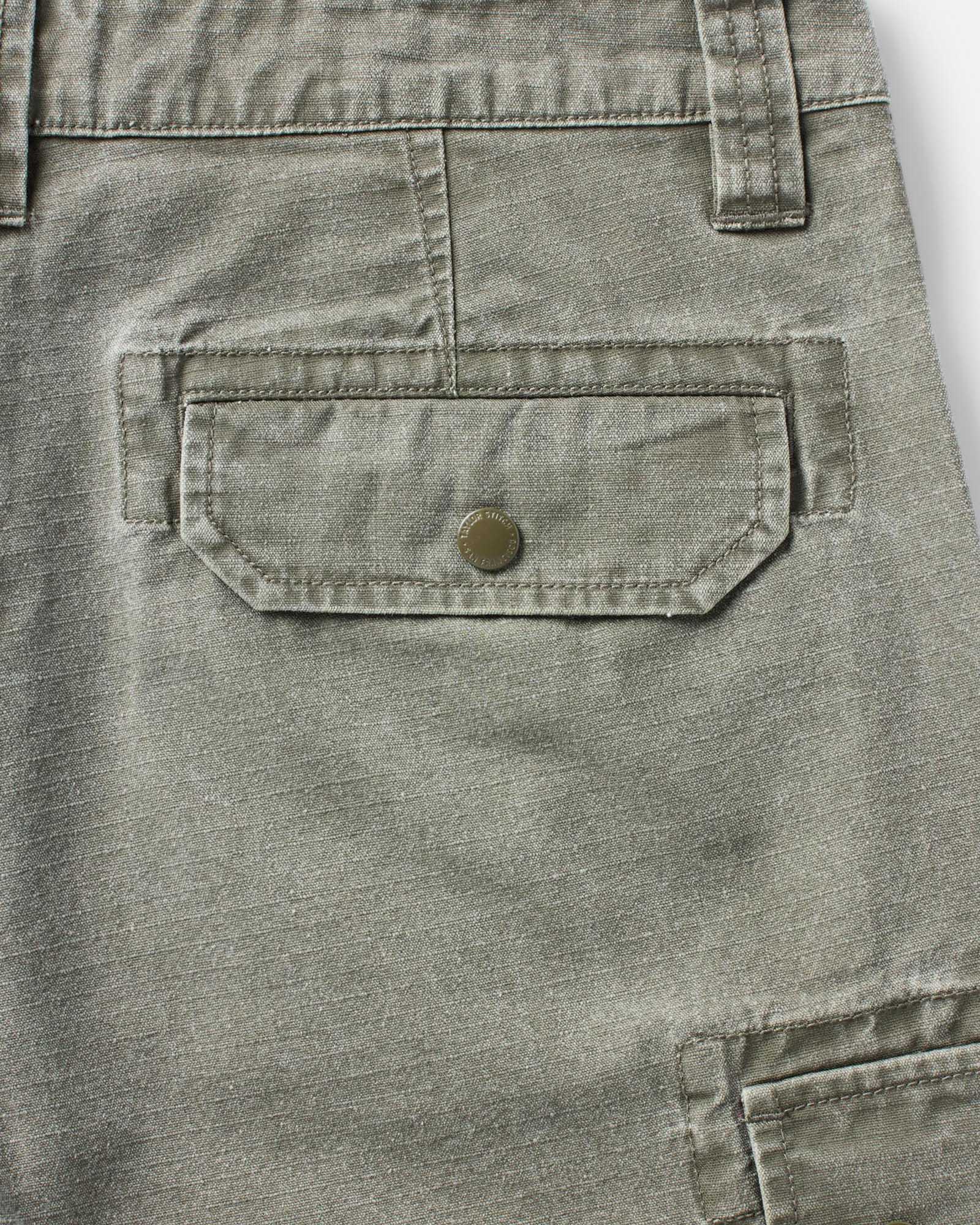 material shot of the back pocket on The Scout Short in Burnt Olive Ripstop, Bottoms by Taylor Stitch