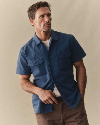 fit model showing off The Short Sleeve Mechanic Shirt in Atlantic Ripstop