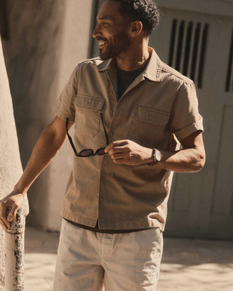 fit model posing in The Short Sleeve Mechanic Shirt in Khaki Ripstop