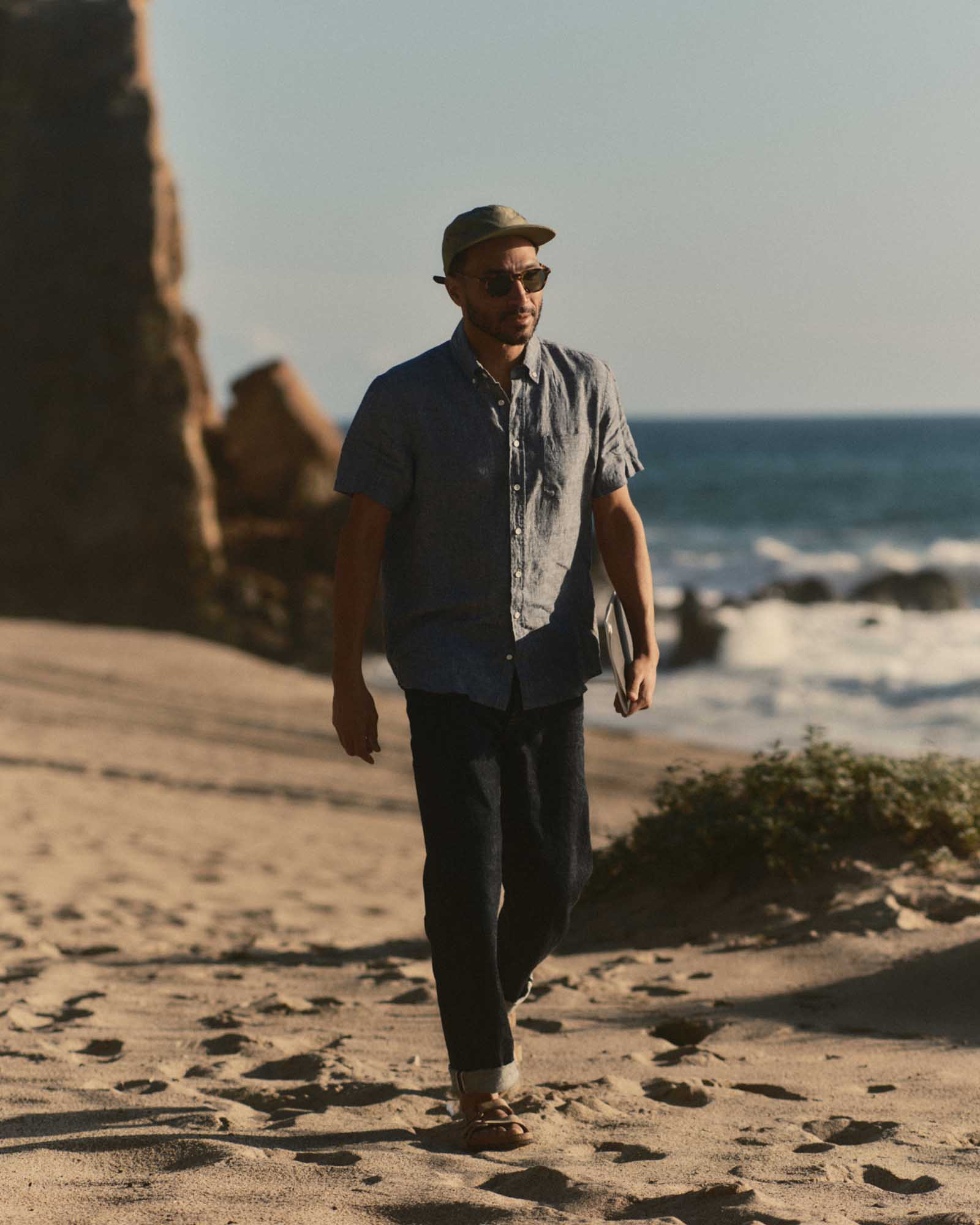 fit model walking wearing The Short Sleeve Jack in Ocean Linen, Wovens by Taylor Stitch