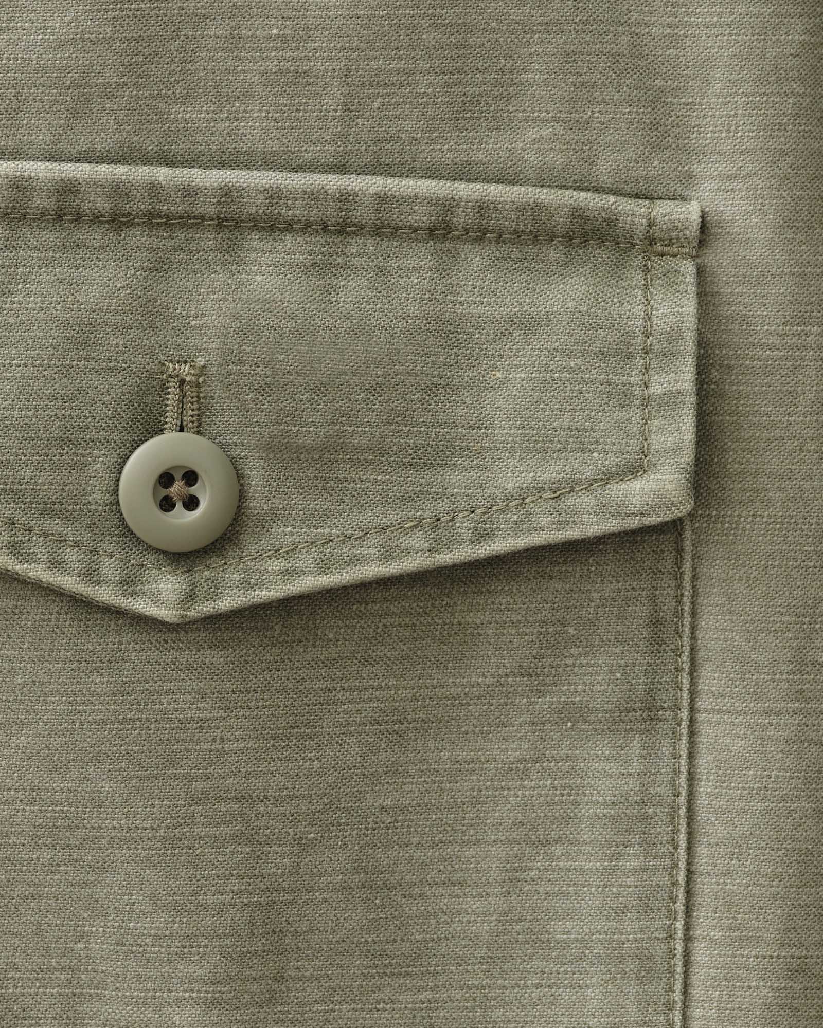 material shot of the pocket on The Surplus Shirt in Field Olive Reverse Sateen, Wovens by Taylor Stitch