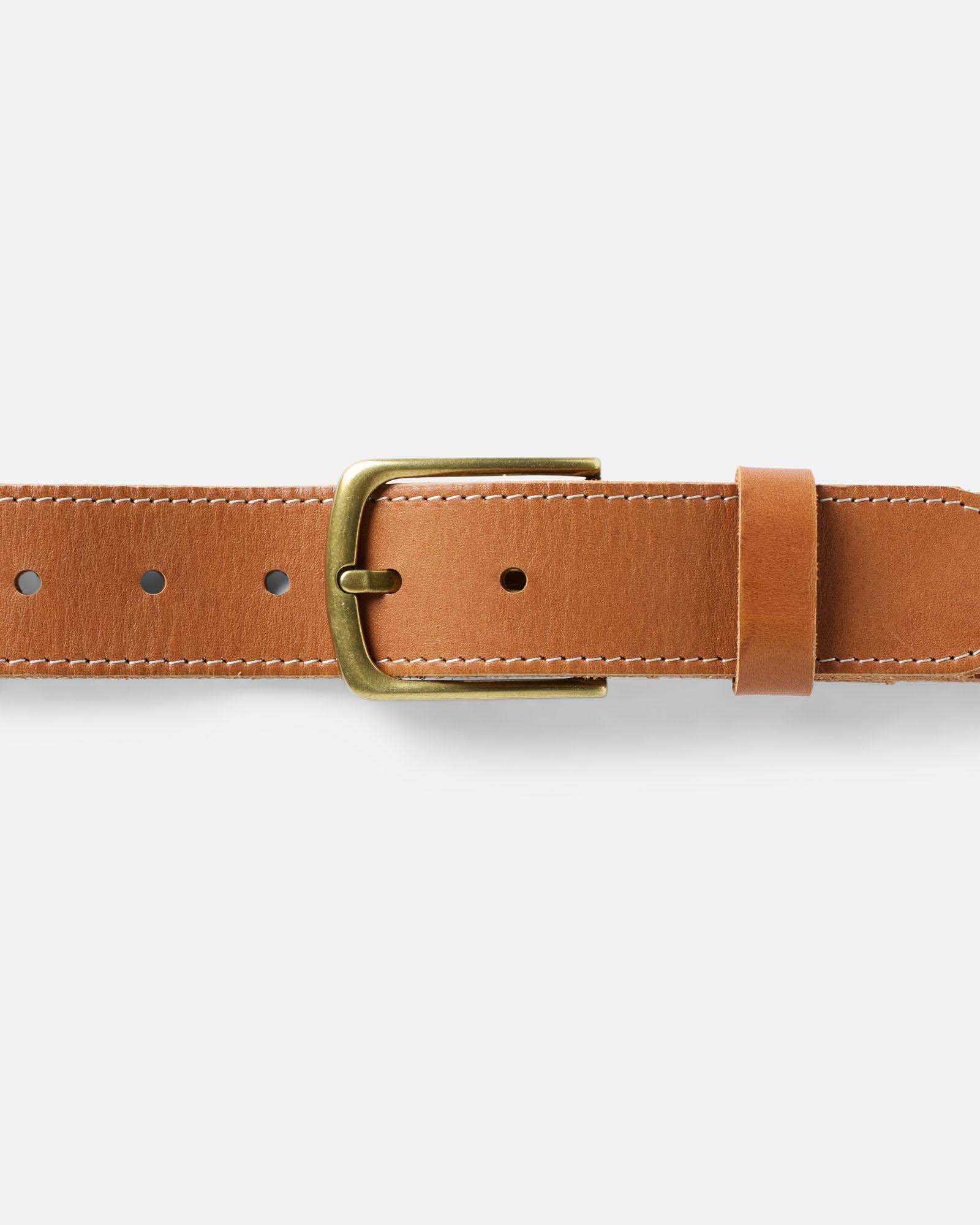 editorial image of the clasped buckle on  The Tour Belt in Washed Saddle, Accessories by Taylor Stitch