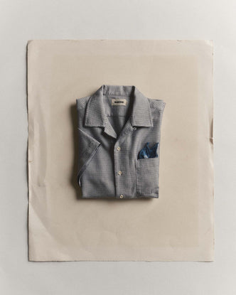 folded flatlay of The Hawthorne Shirt in Blue Pin Dot Dobby