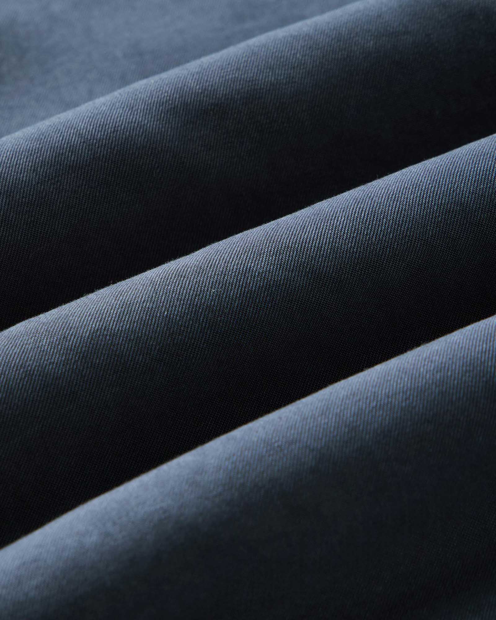 material shot of the fabric on The Shore Shirt in Navy Tencel, Wovens by Taylor Stitch
