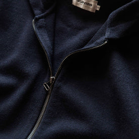 material shot of the antique zipper on The Portola Hoodie in Midnight Merino