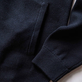 material shot of the ribbed cuffs on The Portola Hoodie in Midnight Merino