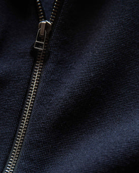 material shot of the zipper on The Portola Hoodie in Midnight Merino, Knits by Taylor Stitch