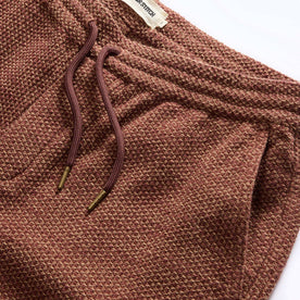 material shot of the waistband on The Apres Pant in Black Cherry Sashiko