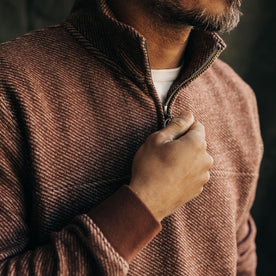 fit model zipping up The Briggs Pullover in Merlot French Terry Twill Knit