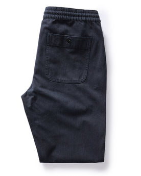 flatlay of the back of The Apres Pant in Navy Twist Jaspe Twill folded, Bottoms by Taylor Stitch