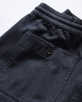 material shot of the back pocket of The Apres Pant in Navy Twist Jaspe Twill, Bottoms by Taylor Stitch